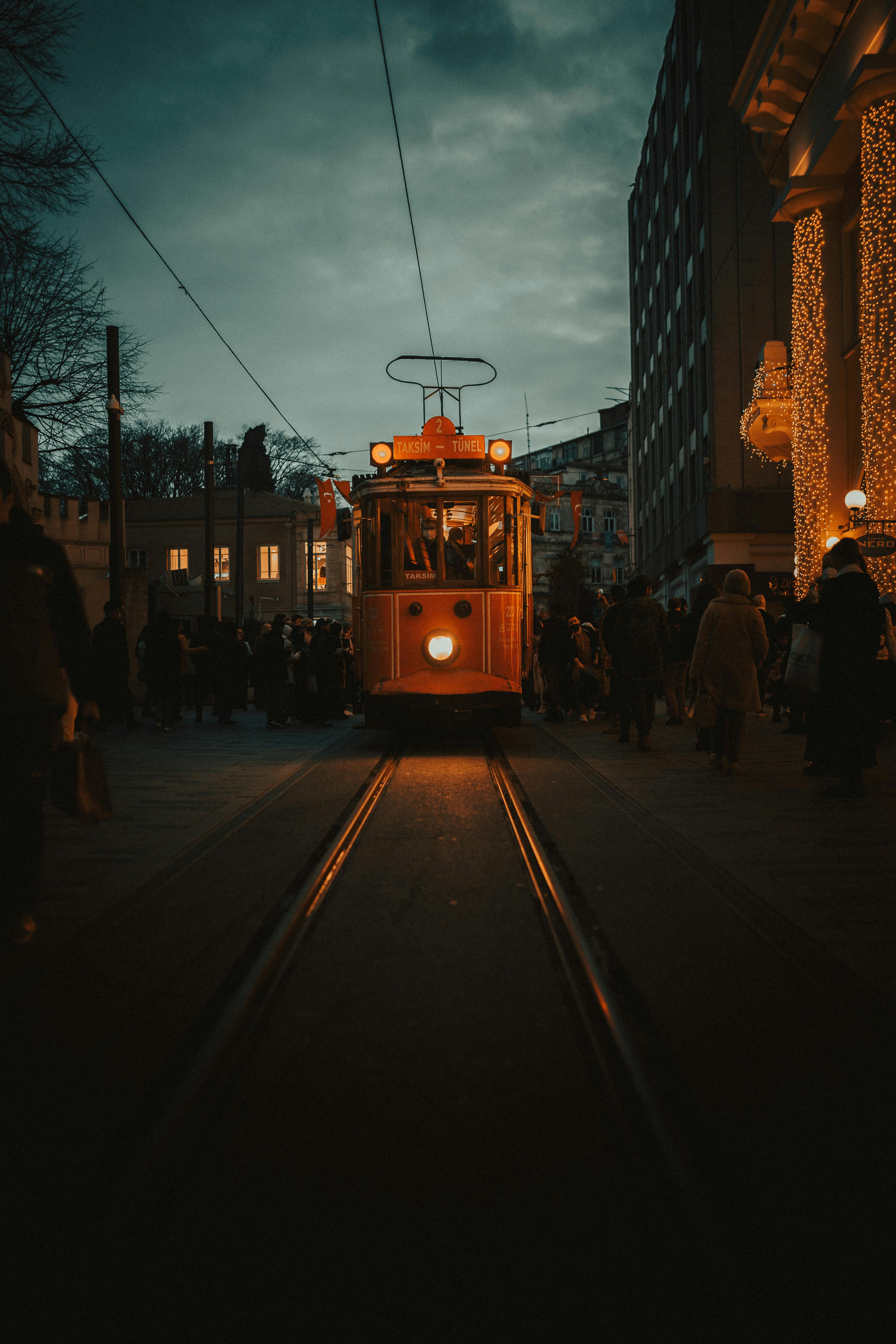 4000x6000 A Tram on a City Street in the Evening · Free