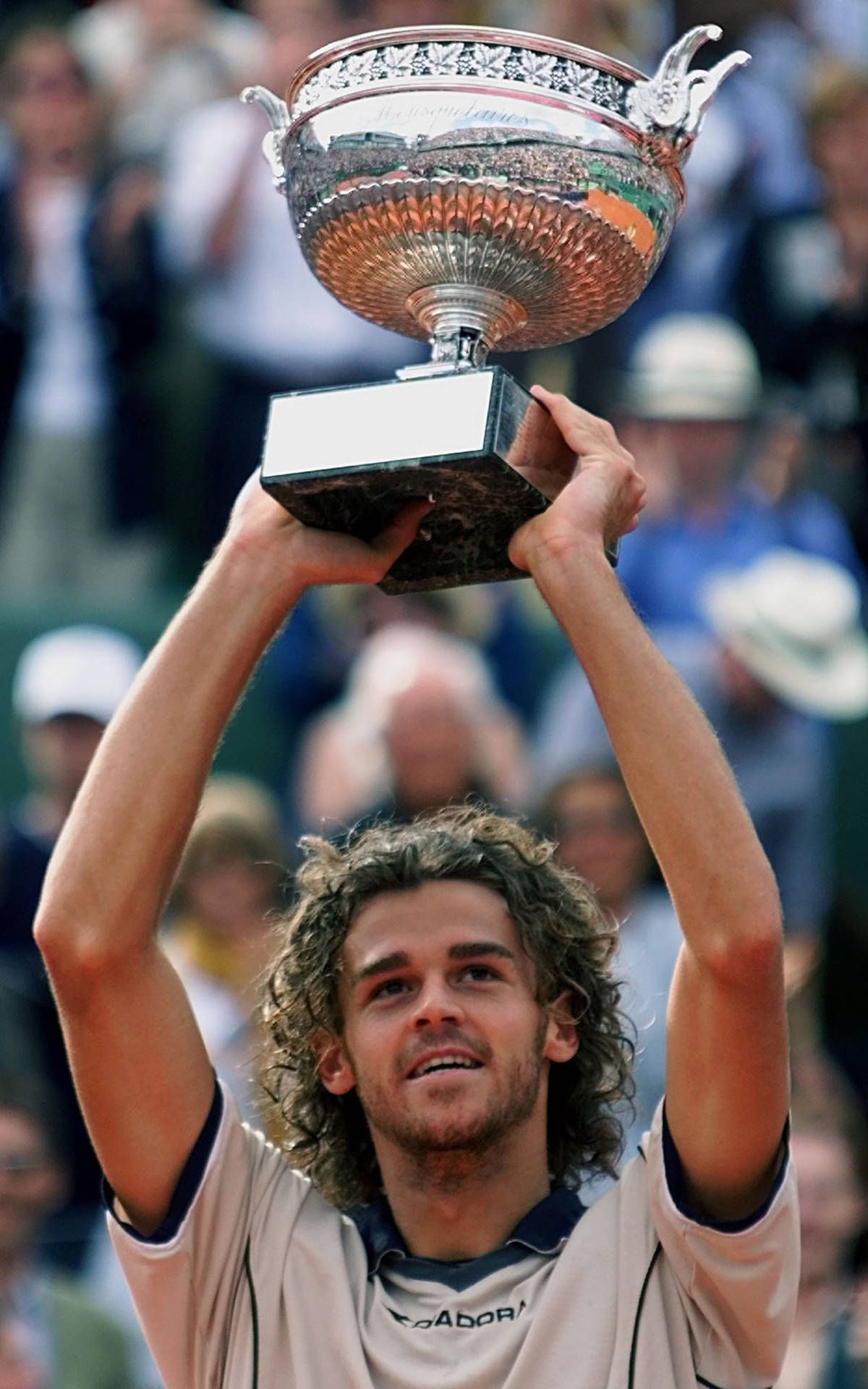 1200x1920 Download Gustavo Kuerten Holding His Trophy Up Wallpaper
