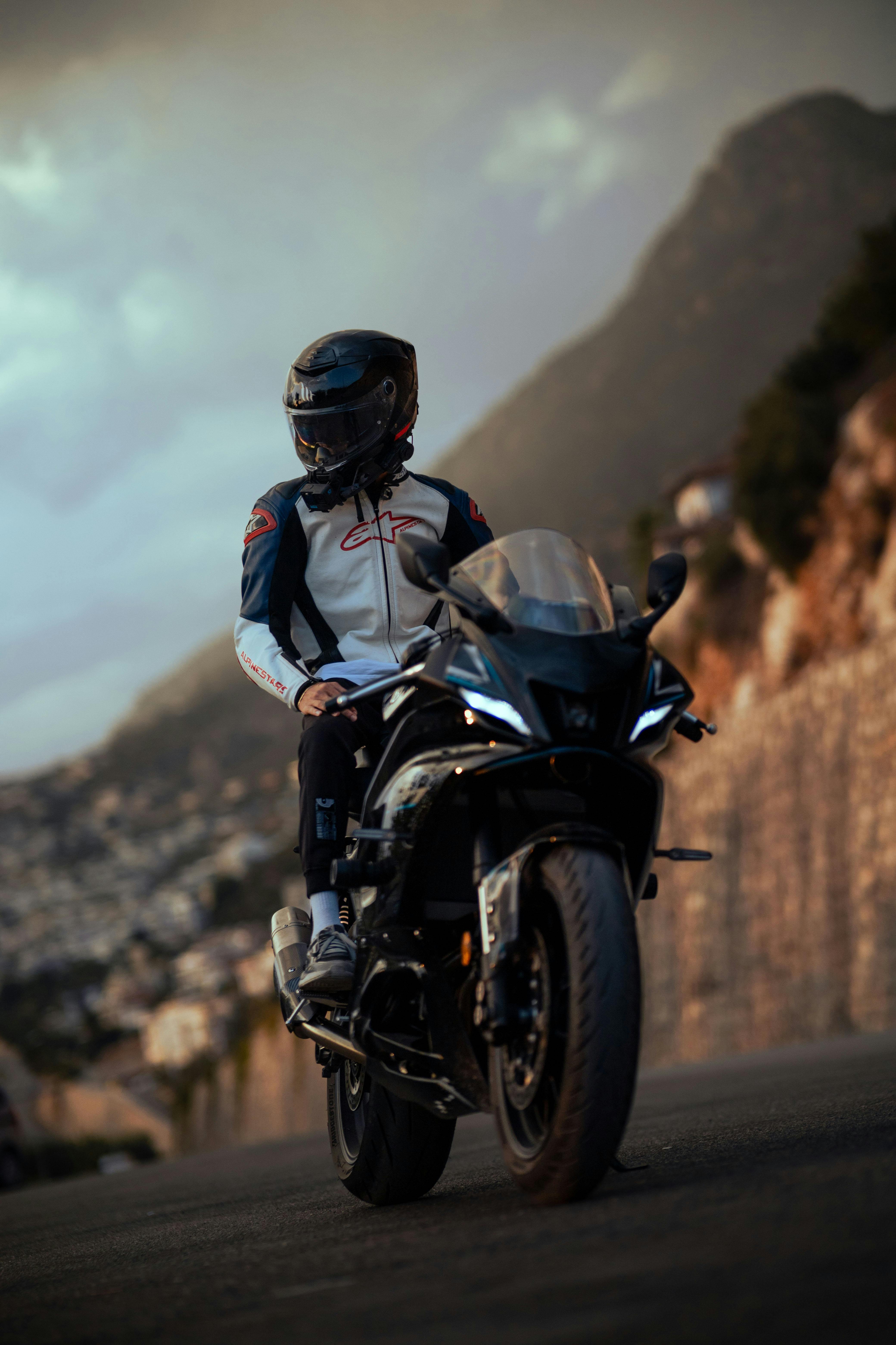 4160x6240 Man In Protective Helmet Sitting On A Black Yamaha YZF R6 Motorcycle · Free
