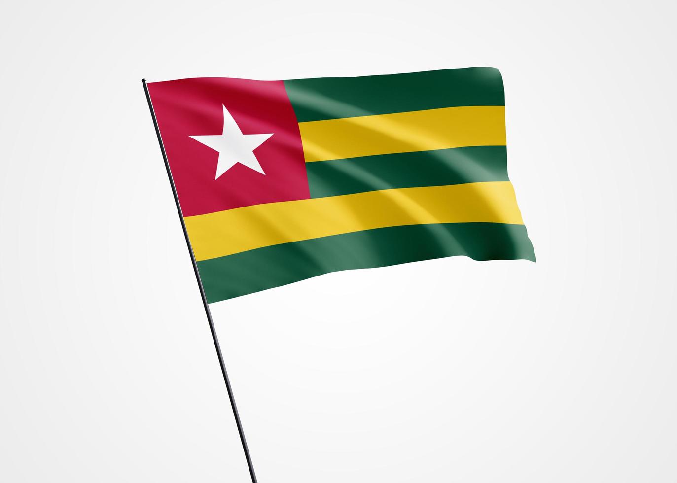 1373x980 Togo flag flying high in the white isolated background. April 27 Togo independence day. World national flag collection world national flag collection