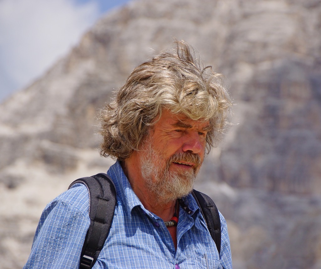 1024x858 A man with a beard wearing a blue shirt. Reinhold messner reinhold messner, people. Domain Media Search Engine Public Domain Search