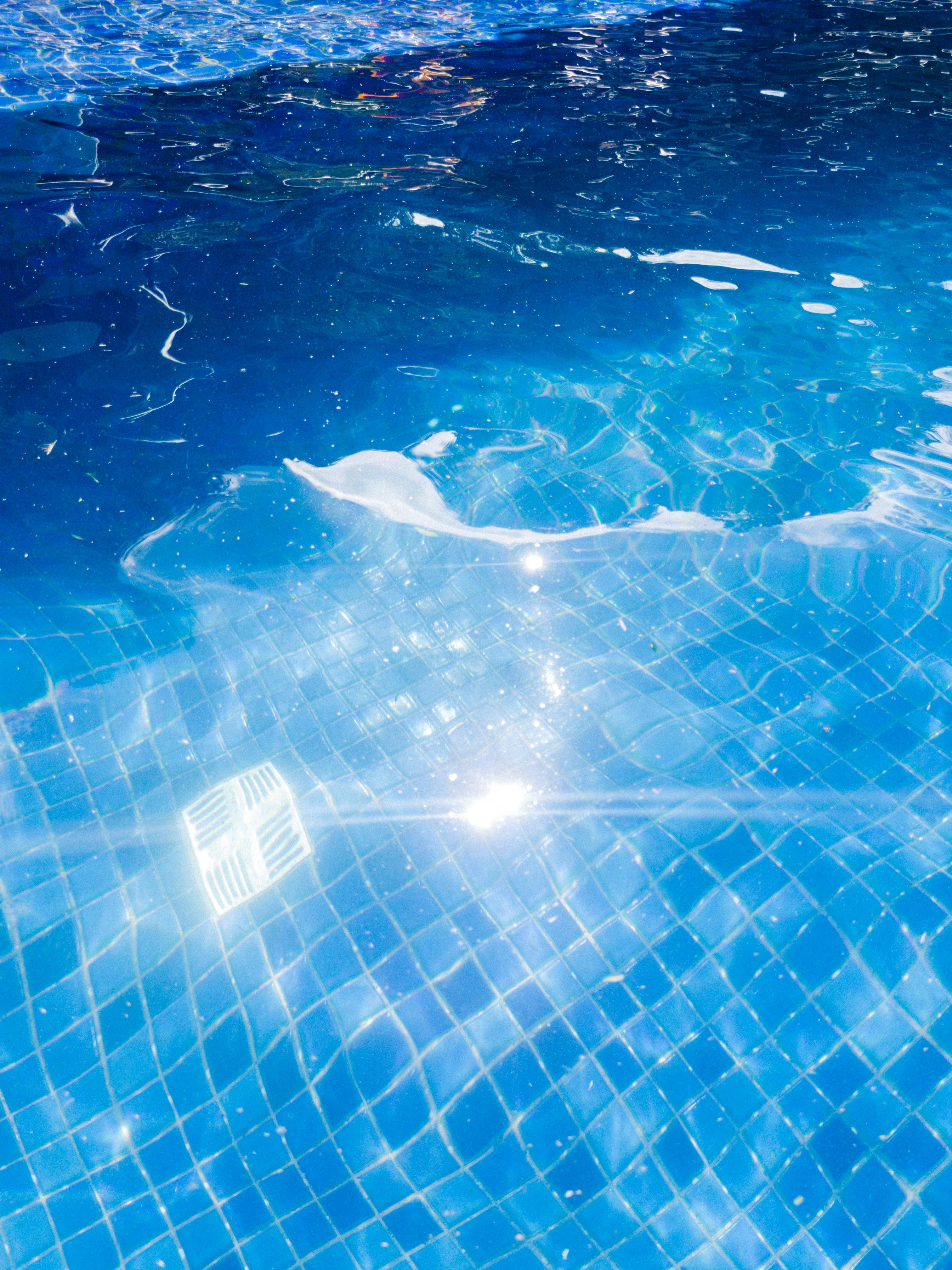 3024x4032 Sunlight Reflection in Swimming Pool Water · Free