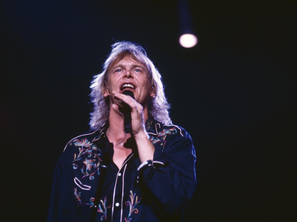 1024x768 John Farnham movie a story of beating the odds