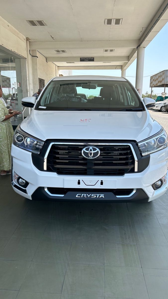 675x1200 Front End of White Toyota Car in Showroom. Inova car toyota, Fortuner legender snapchat, Toyota innova