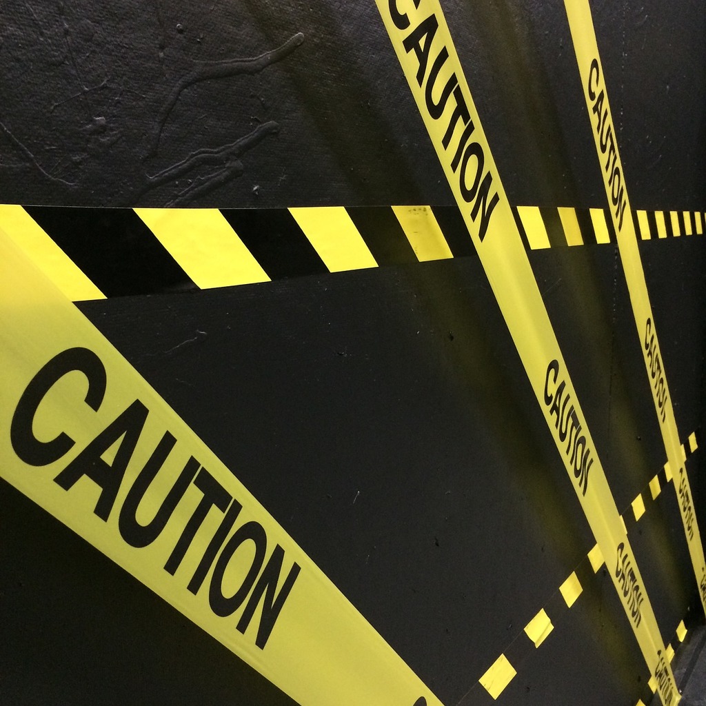 1024x1024 A black and yellow caution tape on a wall. Caution tape yellow. Domain Media Search Engine Public Domain Search