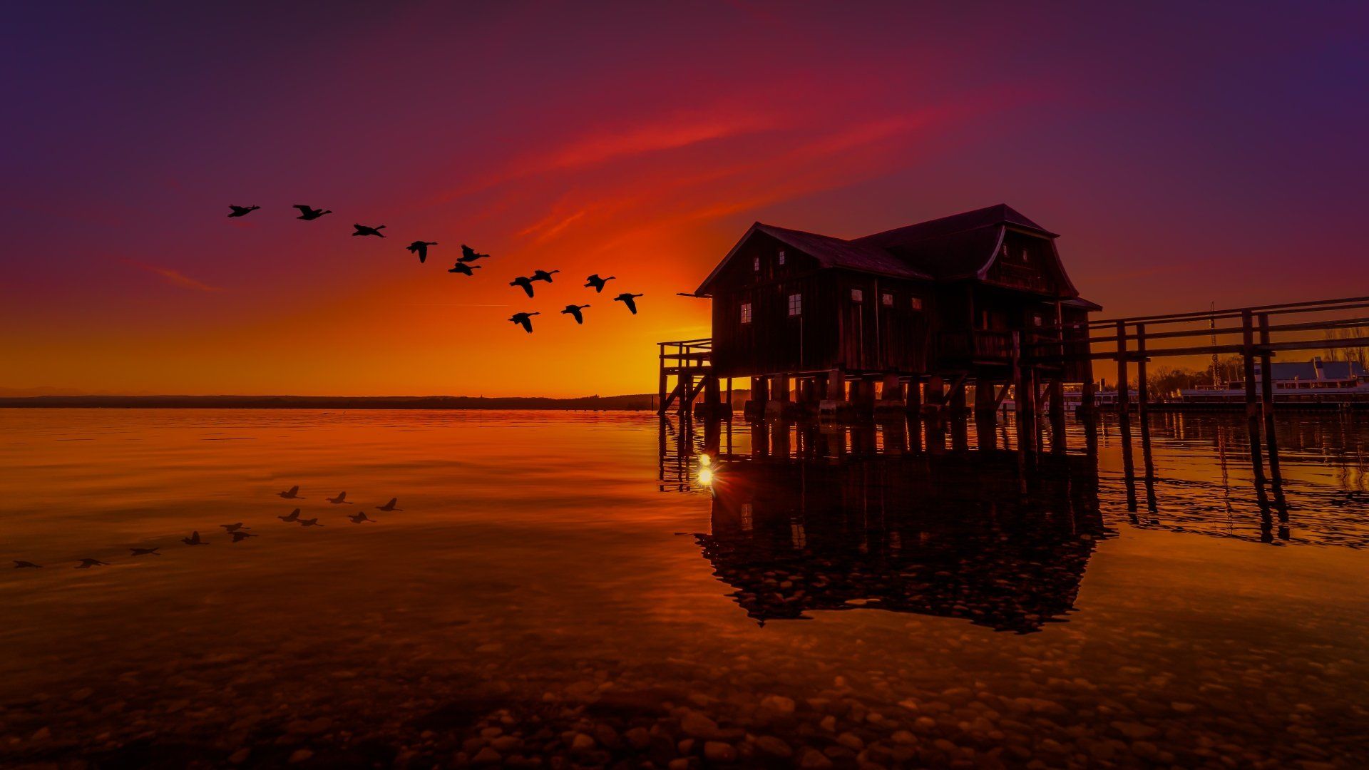 1920x1080 Sunset Serenity: 4K Ultra HD Lake Reflection Wallpaper