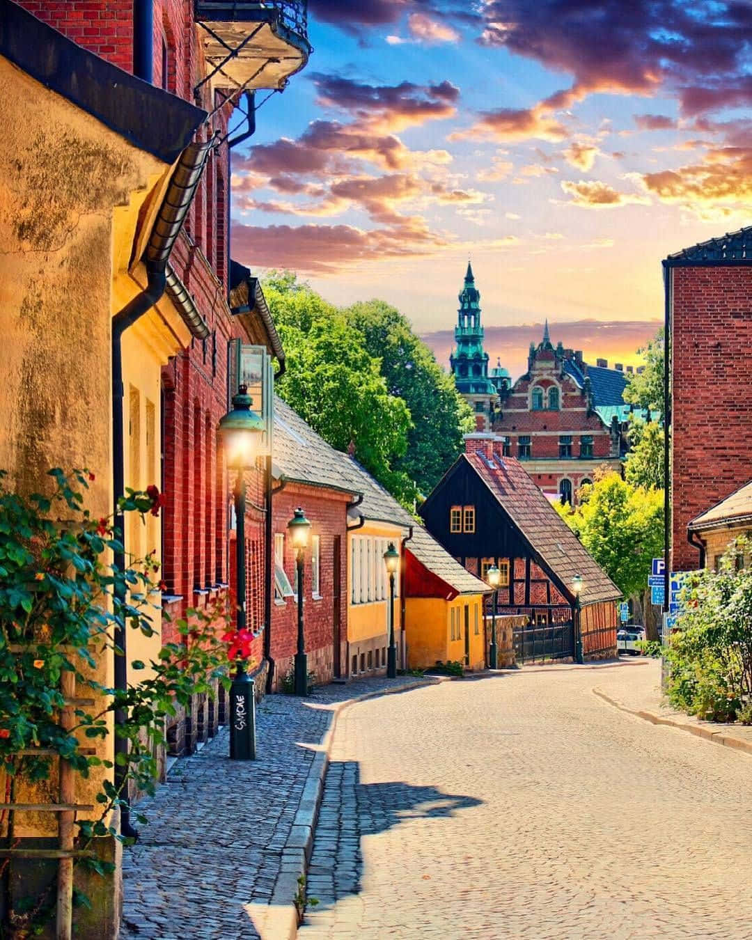 1080x1350 Download Charming view of historical Lund city, Sweden Wallpaper