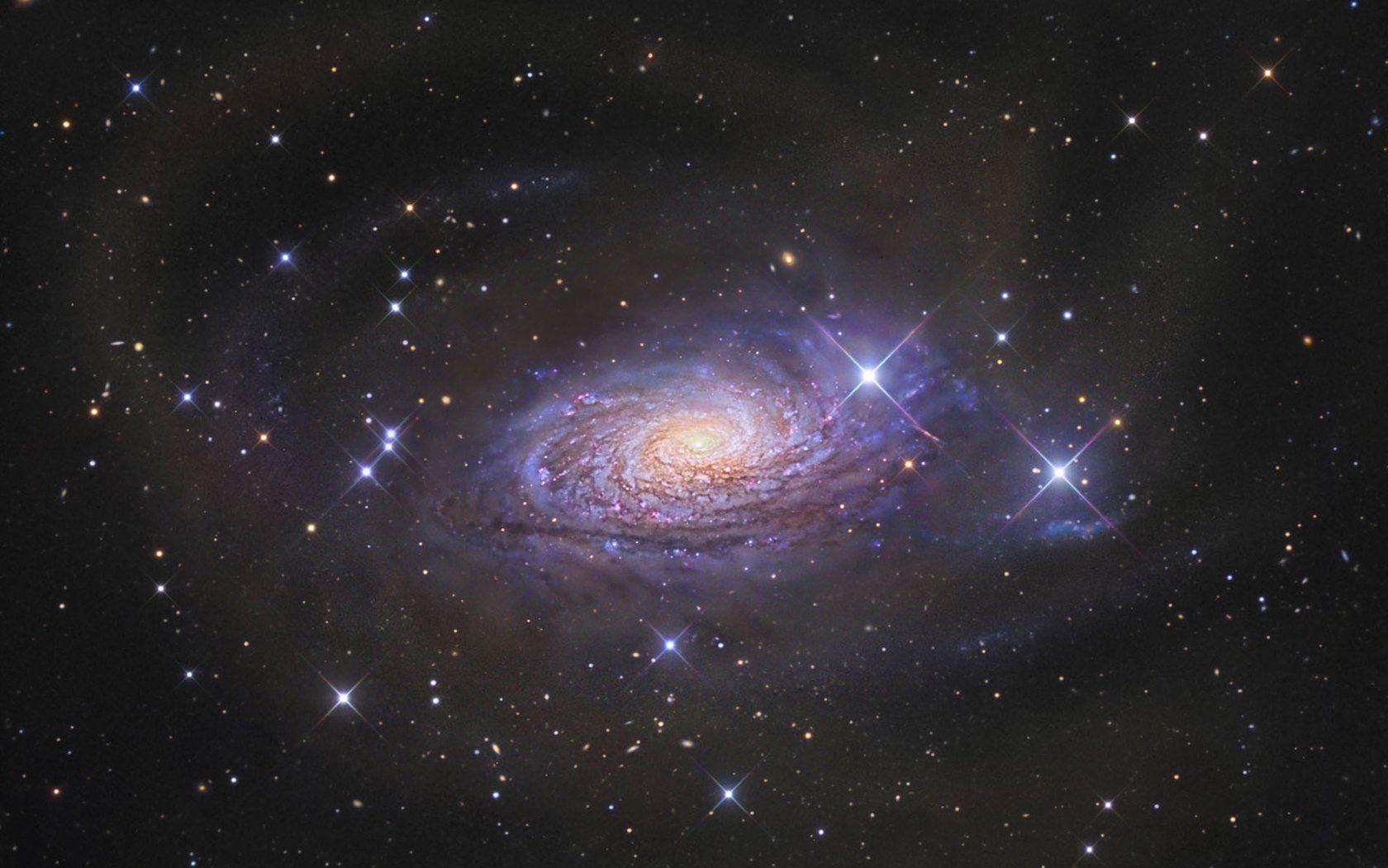 1680x1050 Sparkling Spiral Galaxy Space Wallpaper