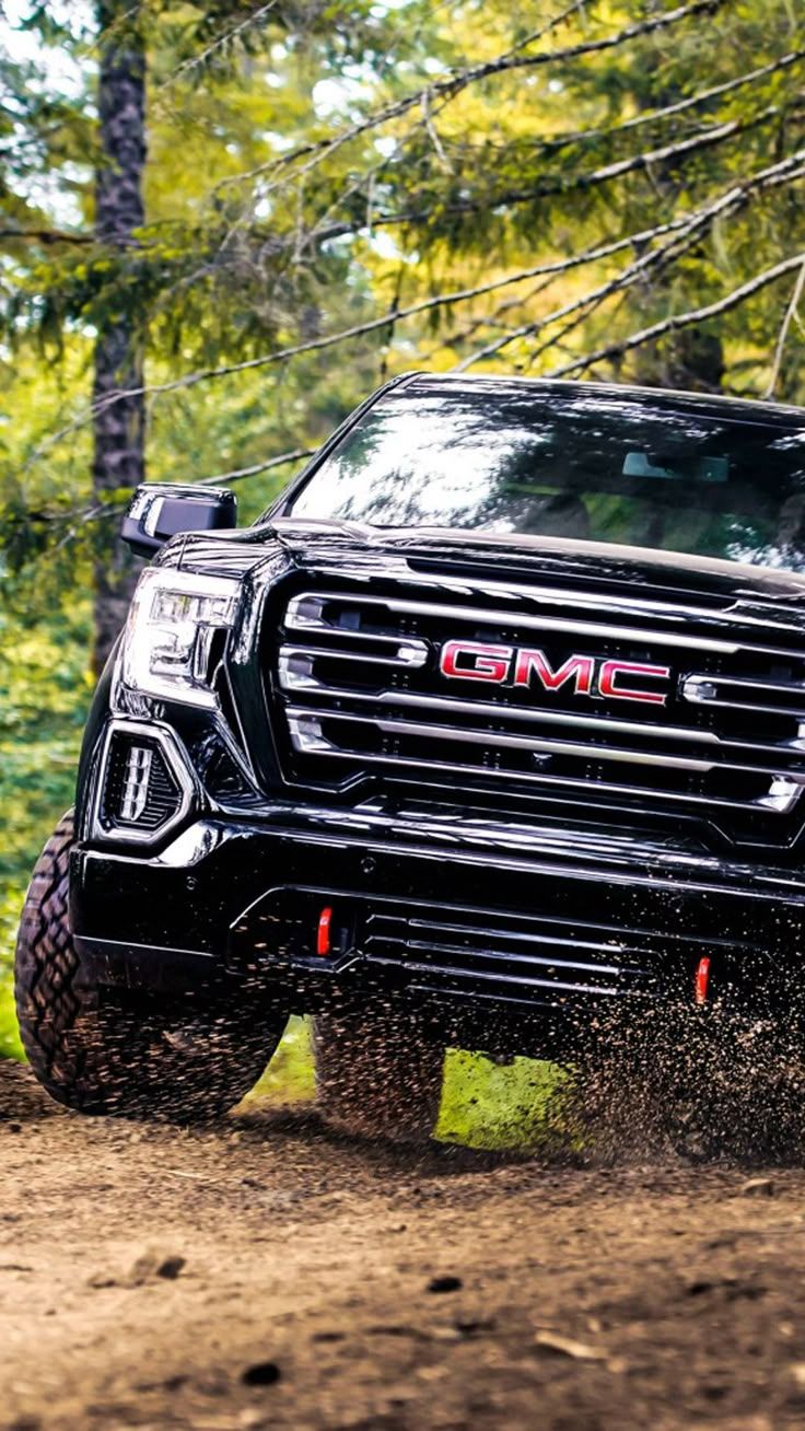 736x1308 GMC Sierra AT4 Crew Cab Off Roading 4K Ultra HD Mobile Wallpaper for iPhone & Android