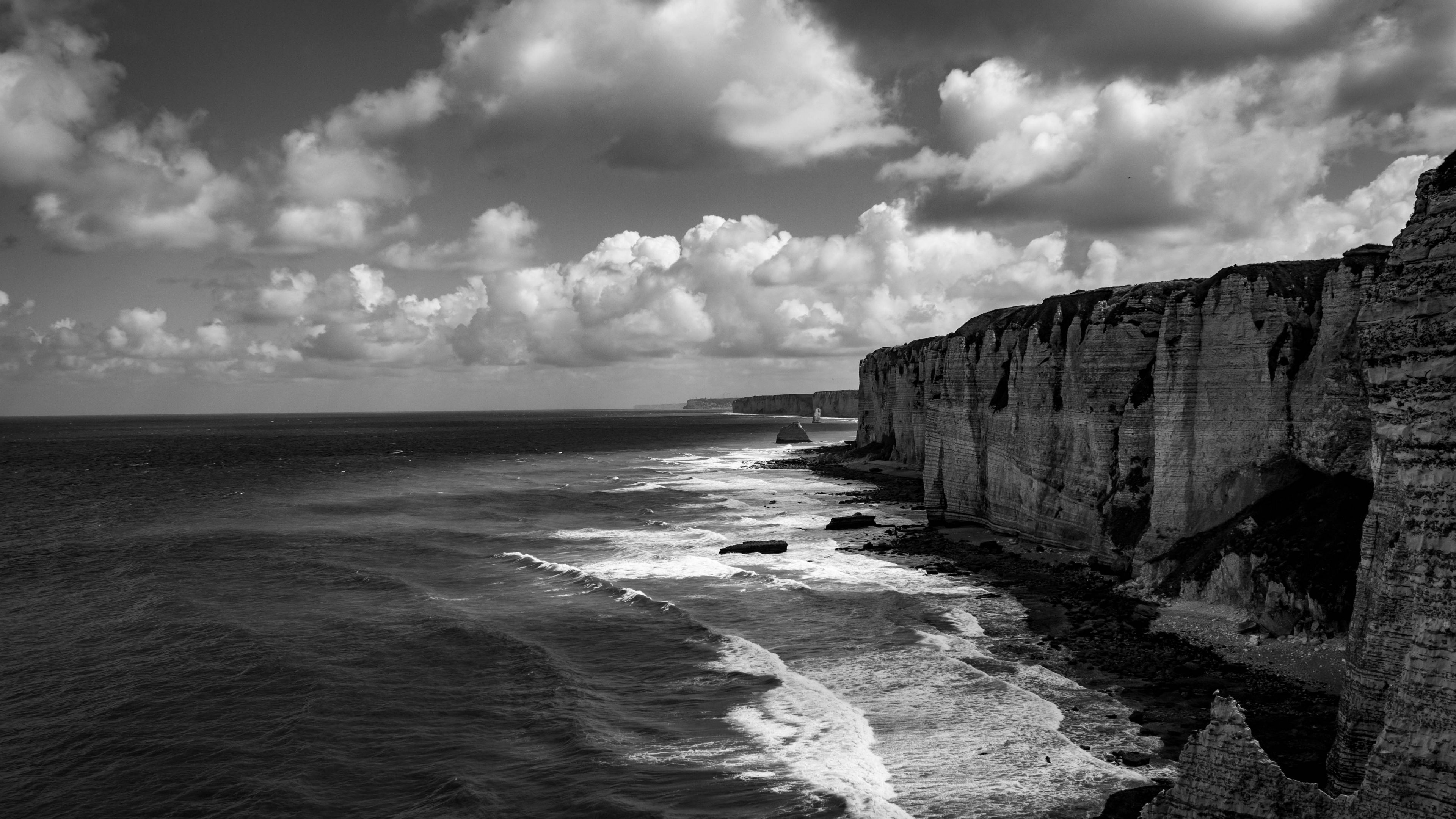 3840x2160 Sea Foam Waves Rocks Cliff Black And White Wallpaper Background 4K HD Dark Background Wallpaper