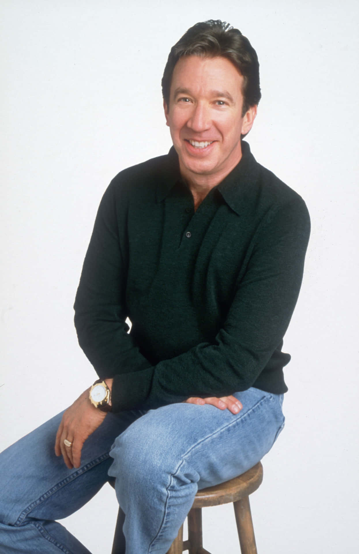 1245x1920 Download Caption: A Gracious Smile from the Legendary Tim Allen Wallpaper