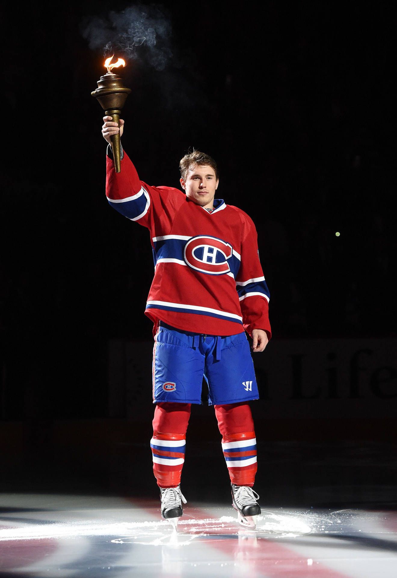 1320x1920 Download Brendan Gallagher Holding Lighted Torch Wallpaper
