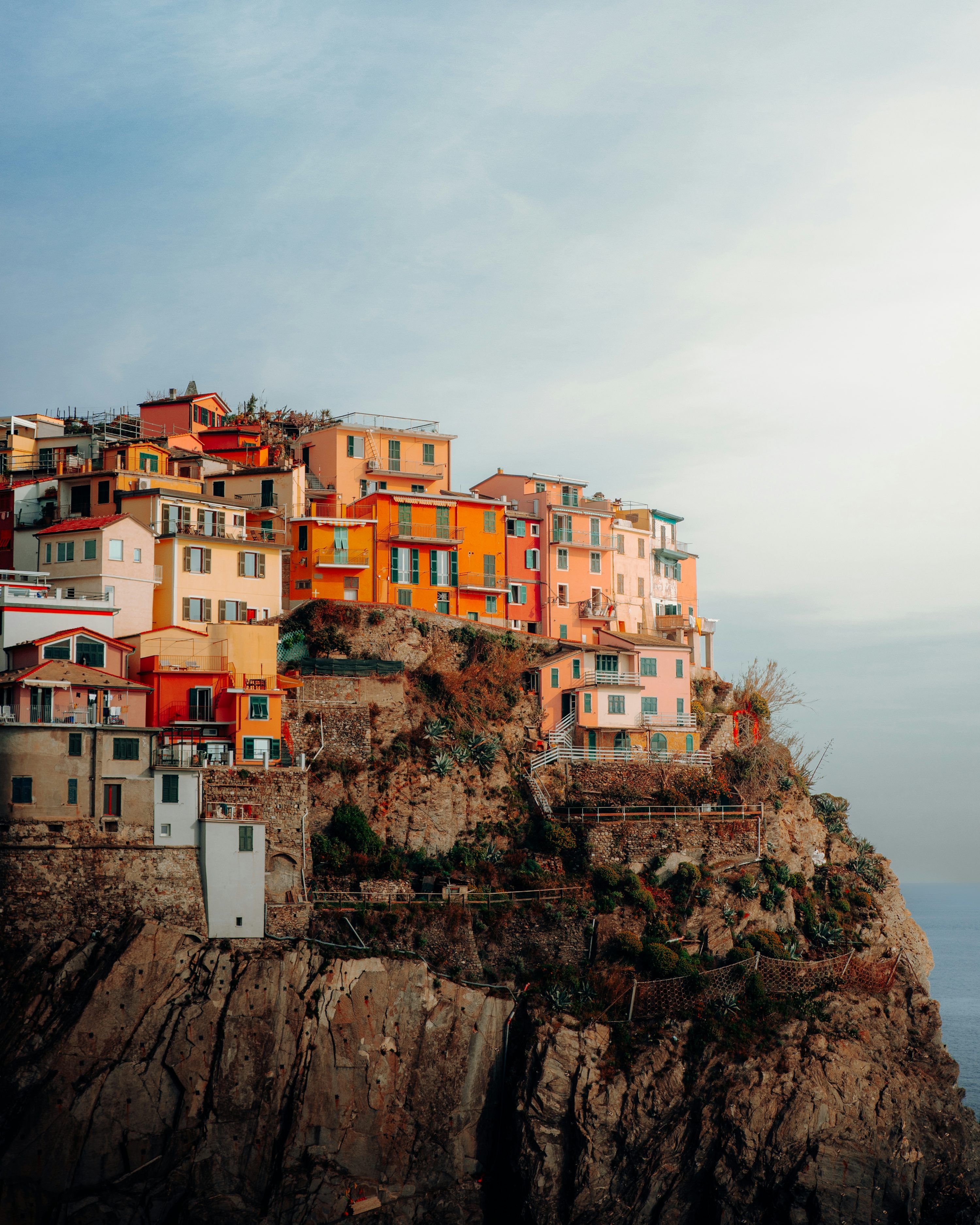 3000x3750 A small village on top of a cliff by the ocean photo