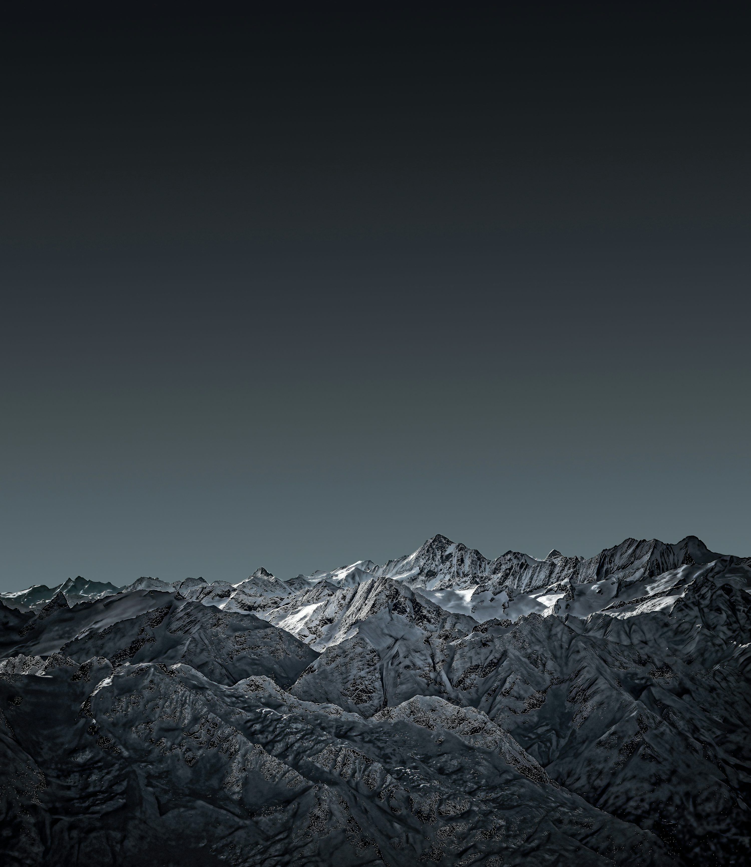 3000x3464 Snow covered mountain under gray sky photo
