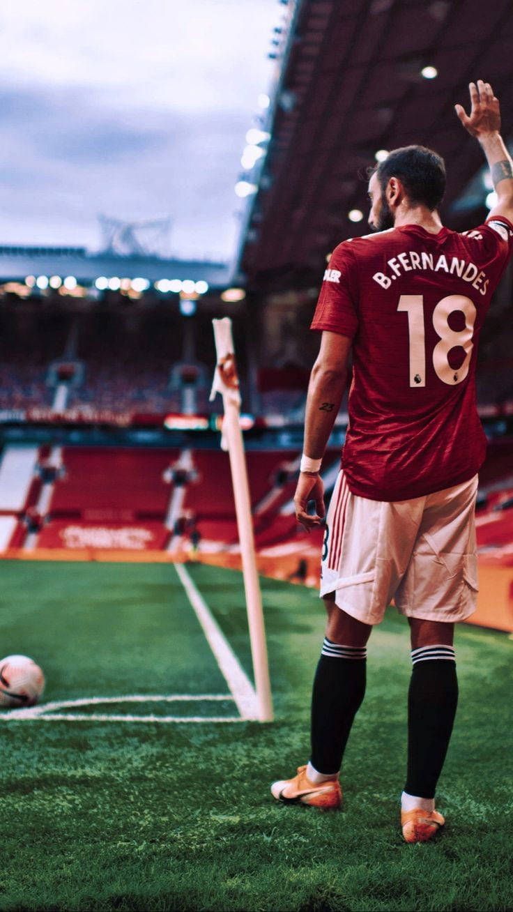 736x1308 Download Bruno Fernandes Manchester United Waves To Fans Wallpaper