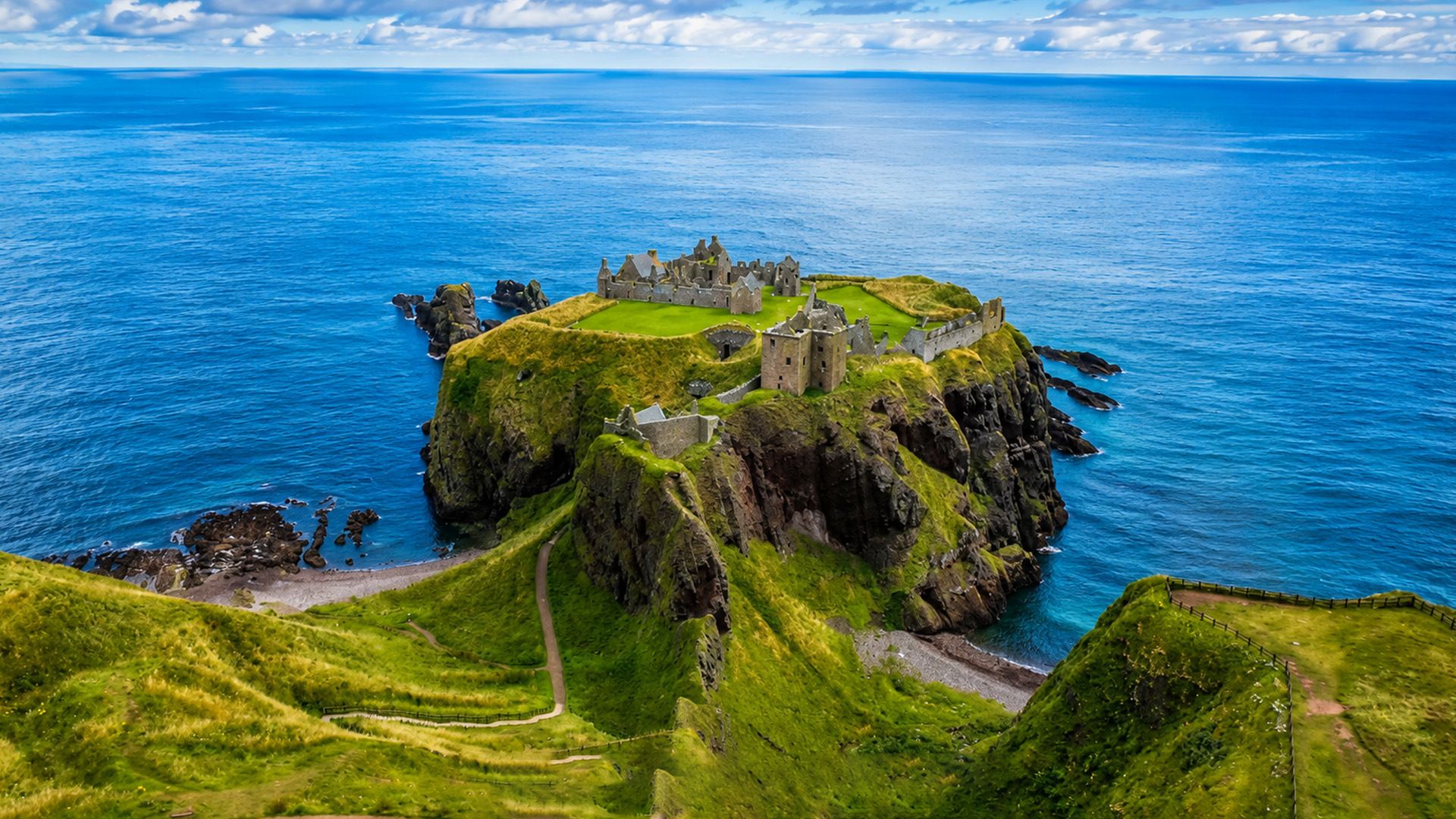 1920x1080 Scotland's cliffside castle rising above the North Sea
