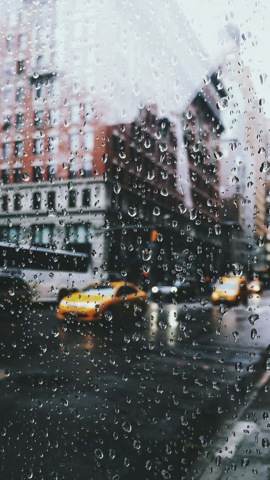 900x1602 Download Enjoy the aesthetic of a rainy day. Wallpaper