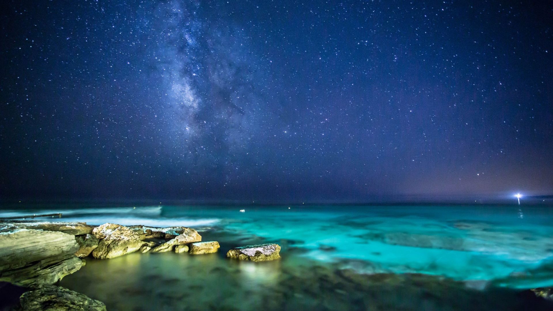 1920x1080 Green Water And Rock Under Blue Sky And Stars HD Space Wallpaper