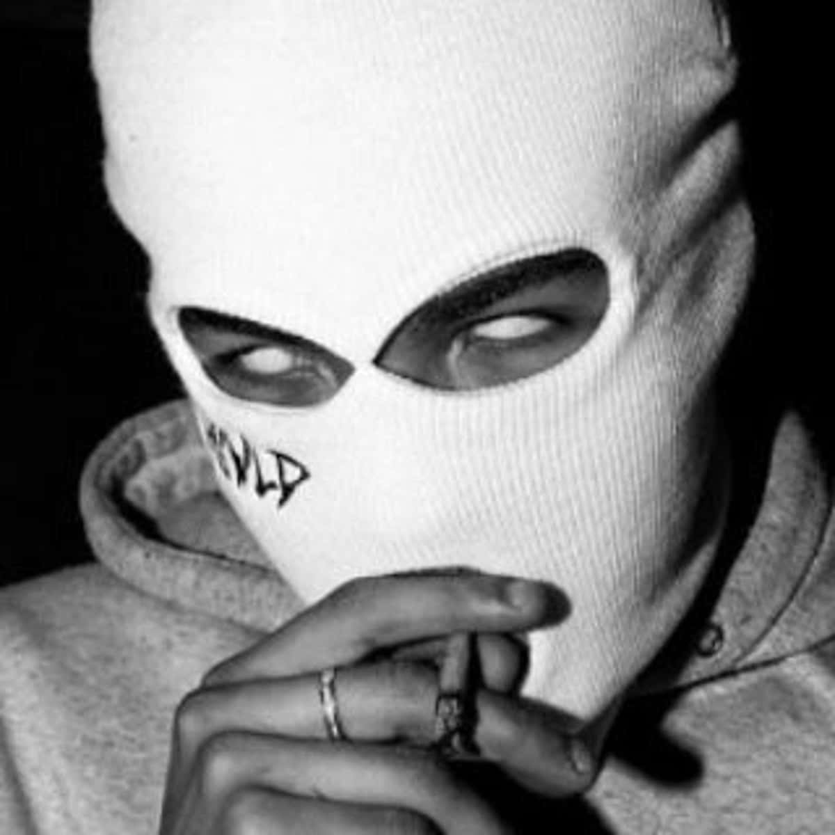 1200x1200 Download Intrigued Man White Mask Wallpaper