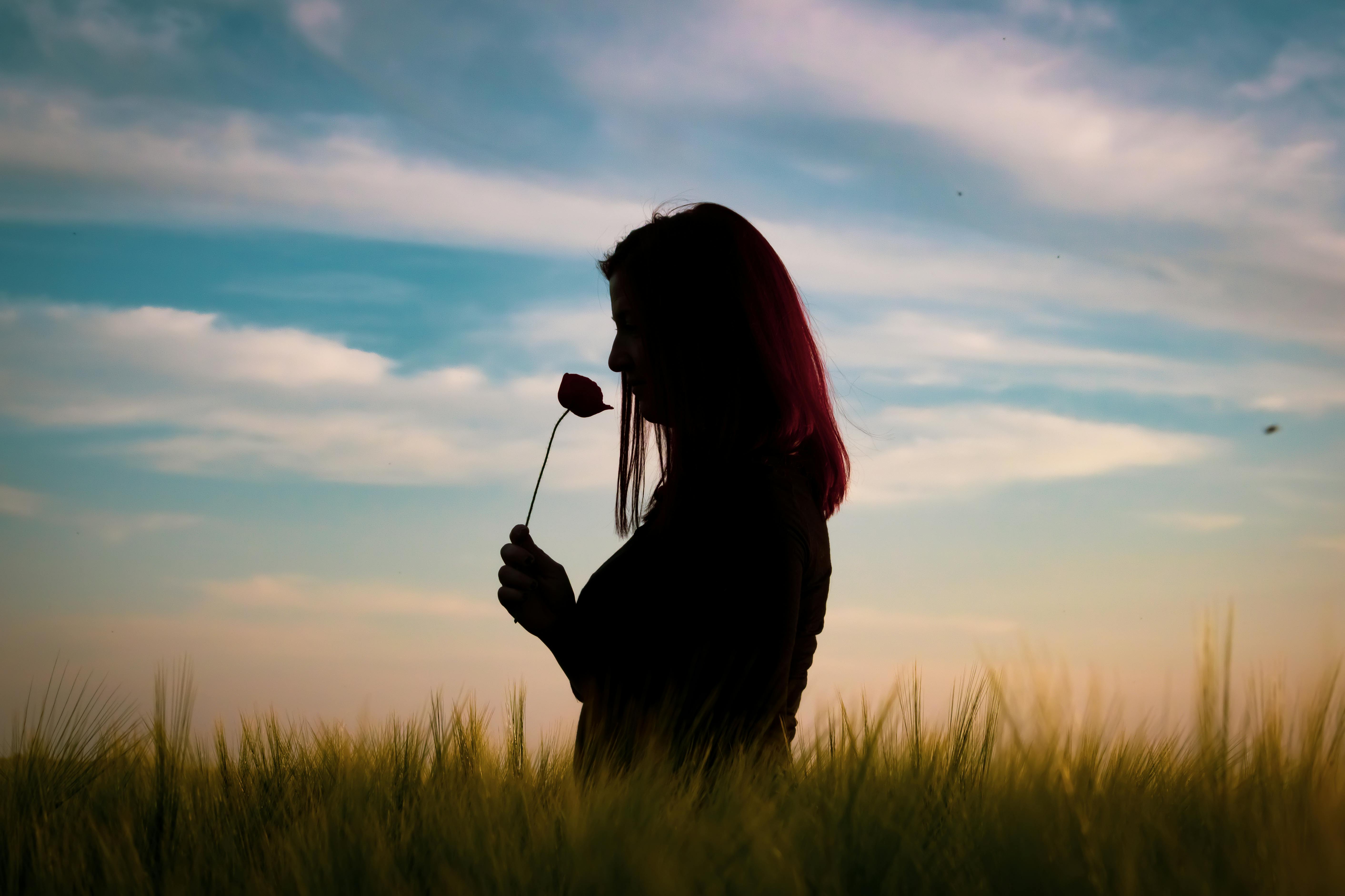 5649x3766 Silhouette of Woman Enjoying Nature at Sunset · Free