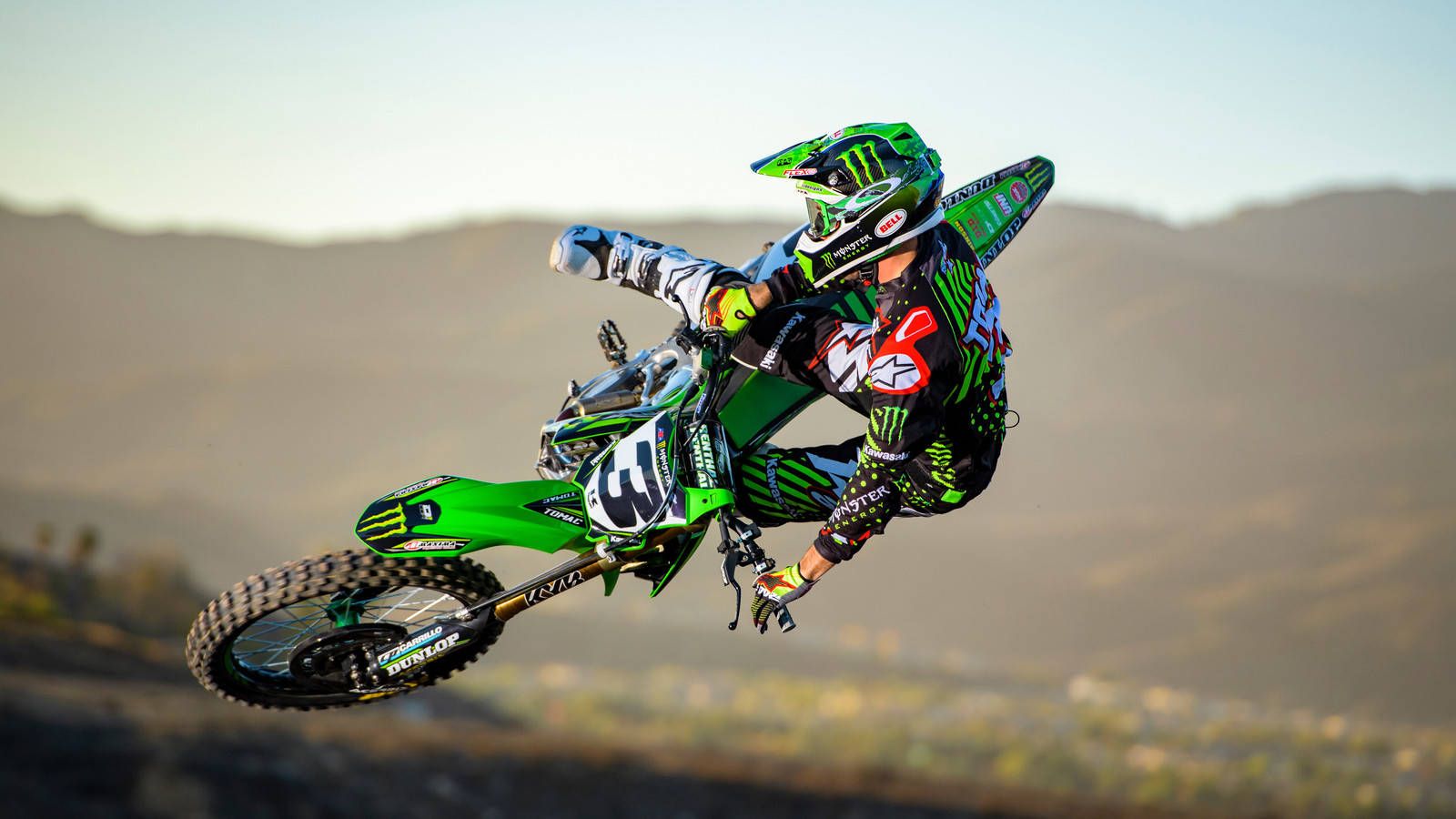 1600x900 Download Thrilling Action with a Monster Dirt Bike Wallpaper