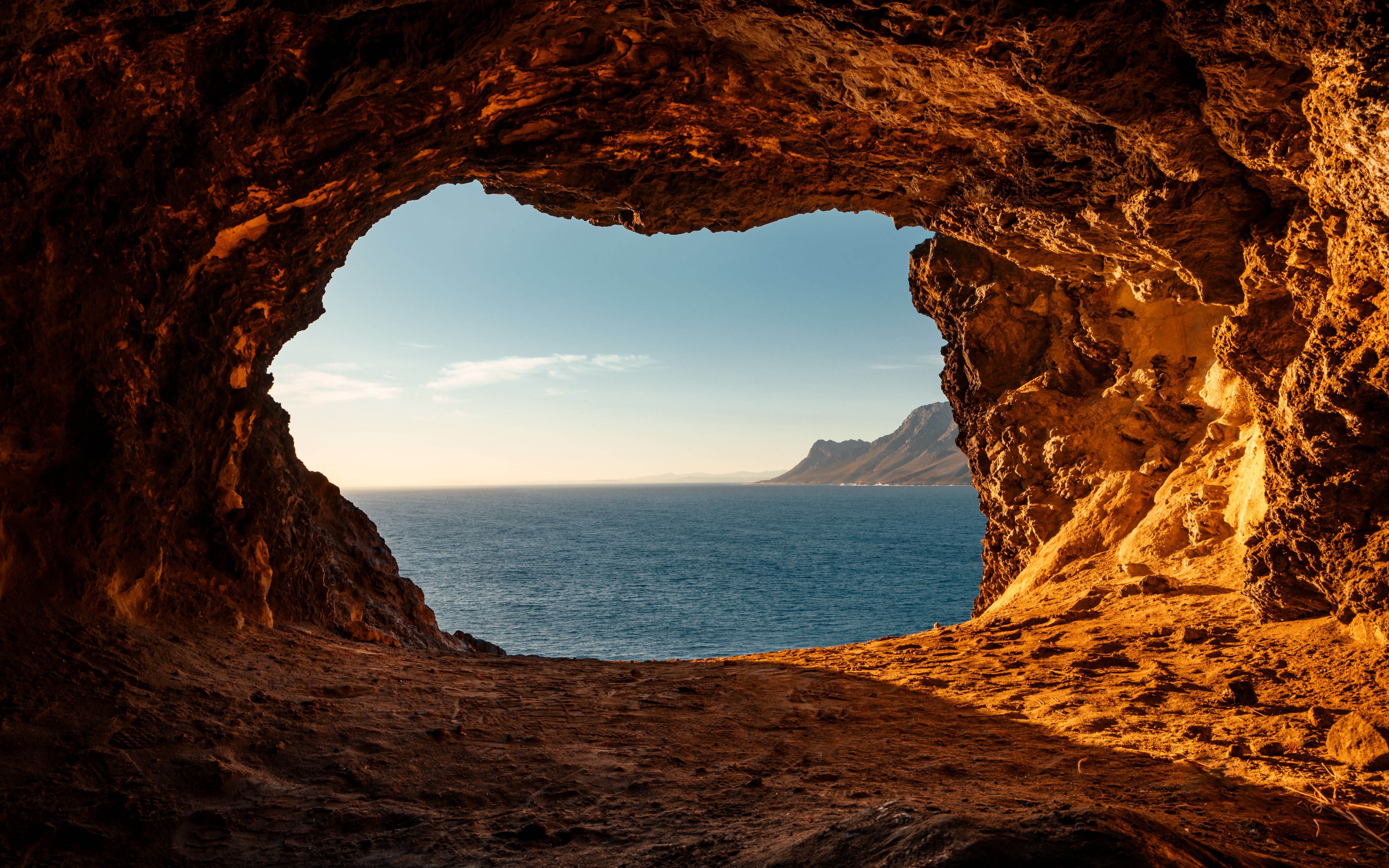 6491x4057 Brown Rock Formation Near Body of Water · Free