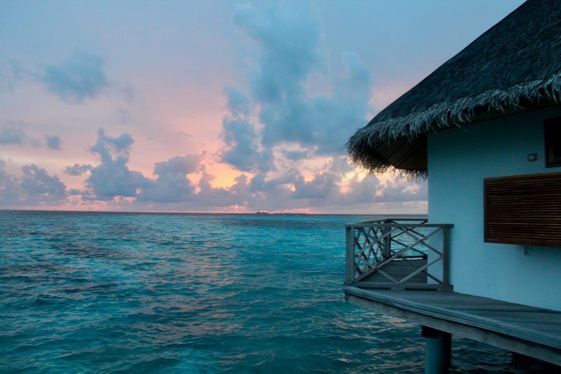 1125x750 Stunning Overwater Bungalow at Sunset · Free