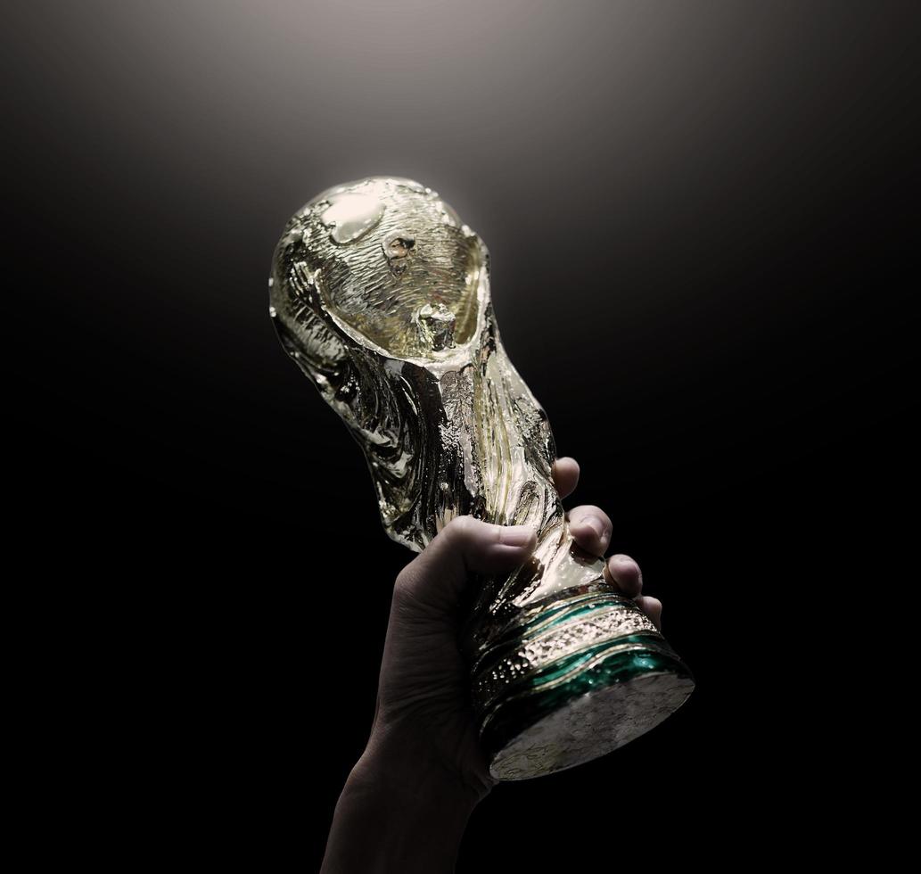 1033x980 Bangkok Thailand. July 15 2018. Mock Up of the FIFA World Cup Trophy in hand