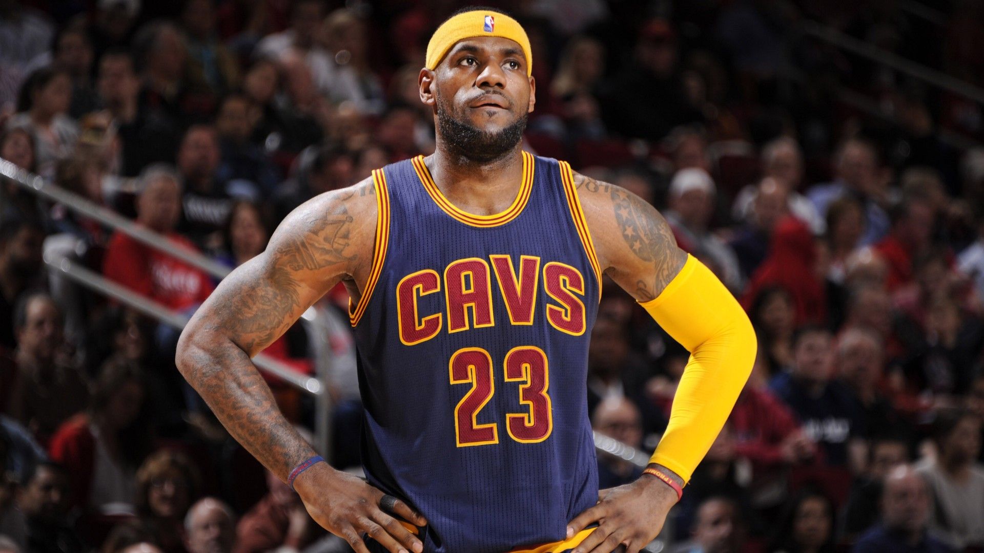 1920x1080 LeBron James Is Having Hands On Hip Standing In Audience Blur Background HD Sports Wallpaper