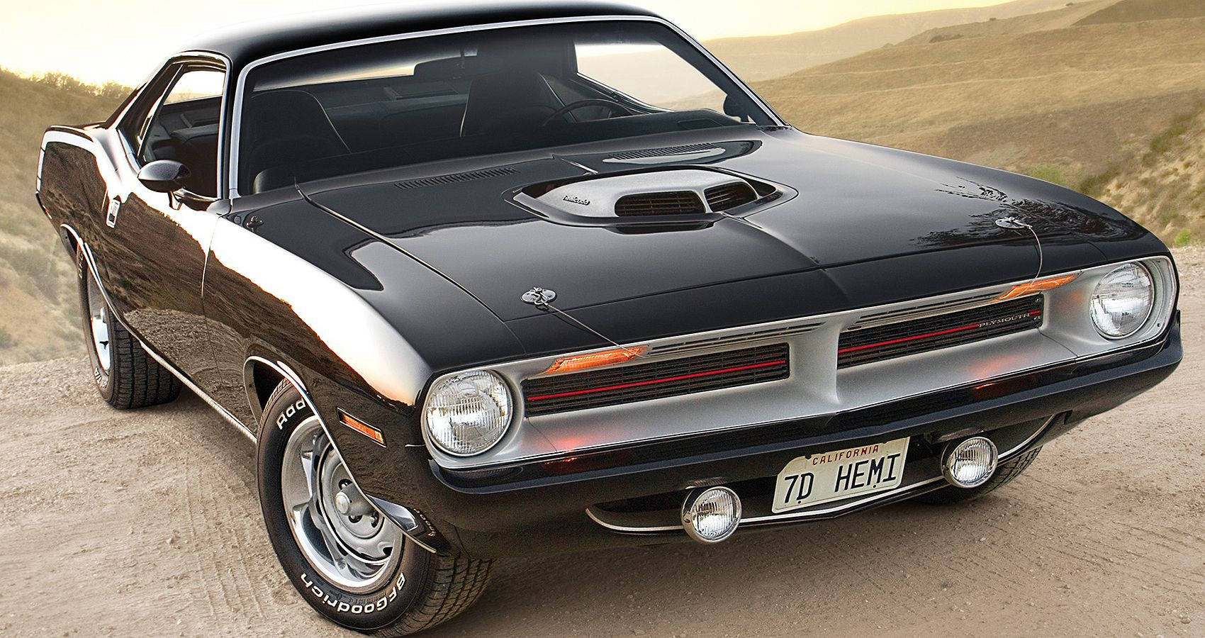 1700x900 Download Black 1970 Plymouth Barracuda On Desert Wallpaper