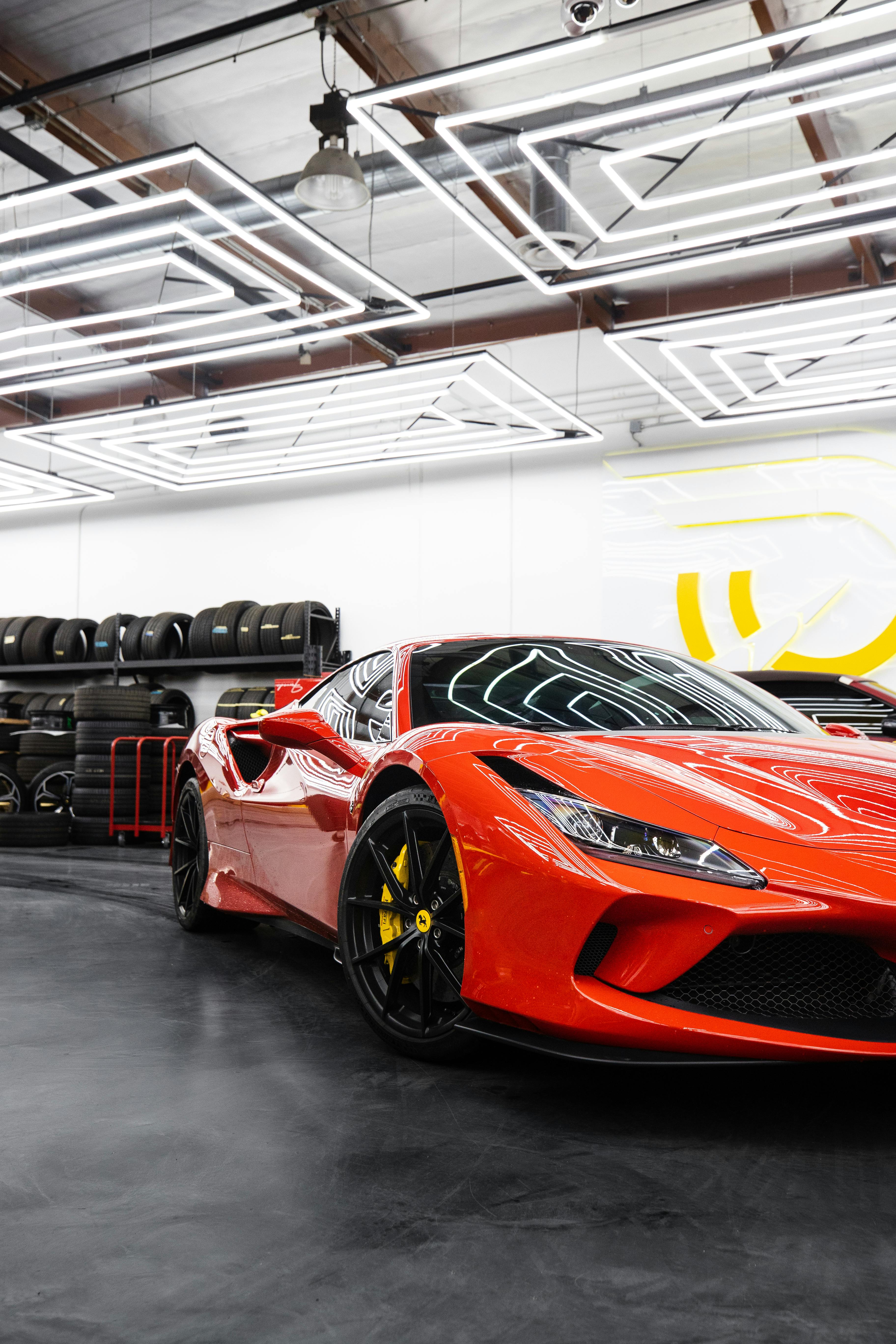 3648x5472 Red Ferrari Parked Inside a Garage · Free