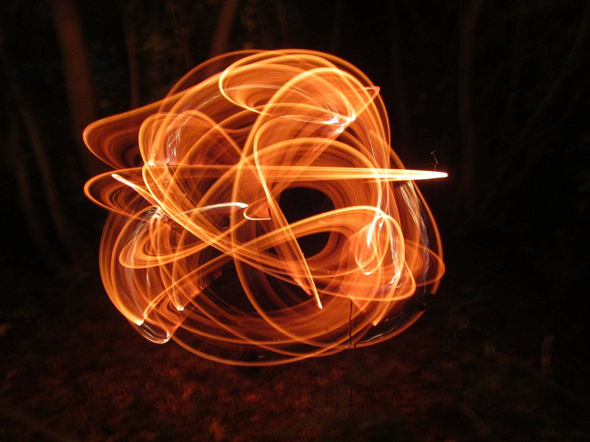1920x1440 4K Ultra HD Fire Juggling Photography: Dancing Flames in Motion