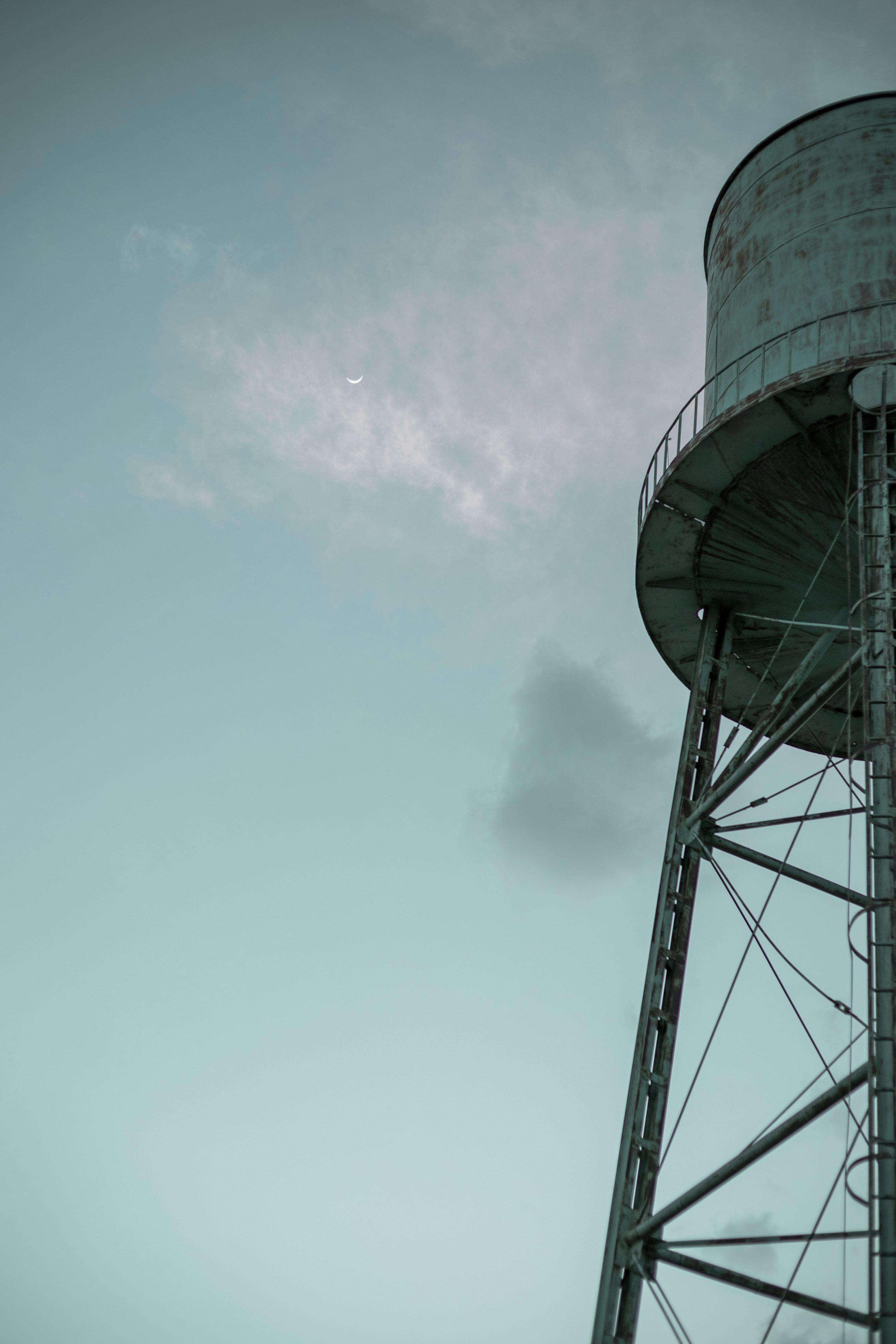 3000x4500 Silhouette of building under cloudy sky during daytime photo