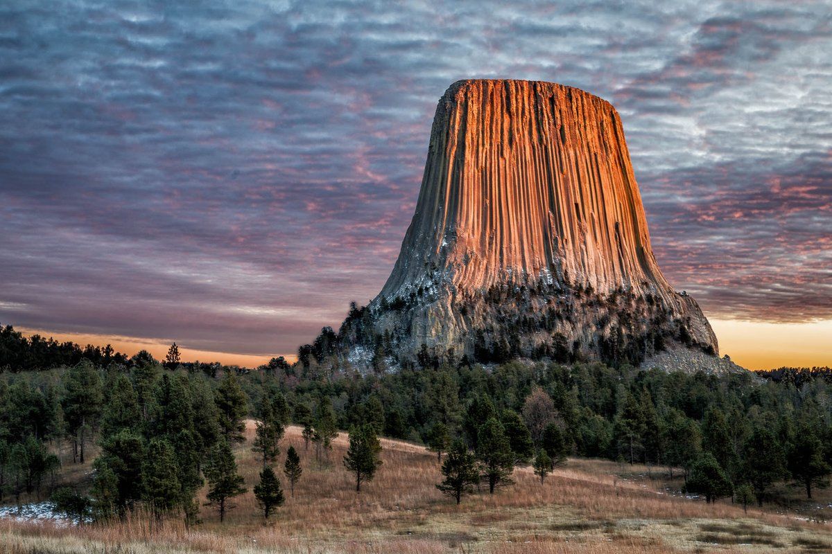 1200x800 Devils Tower is an iconic formation, a monolith rising above the surrounding countryside. As you explore the monument, the Tower stands as a remarkable and enduring presence in the landscape. Photo by