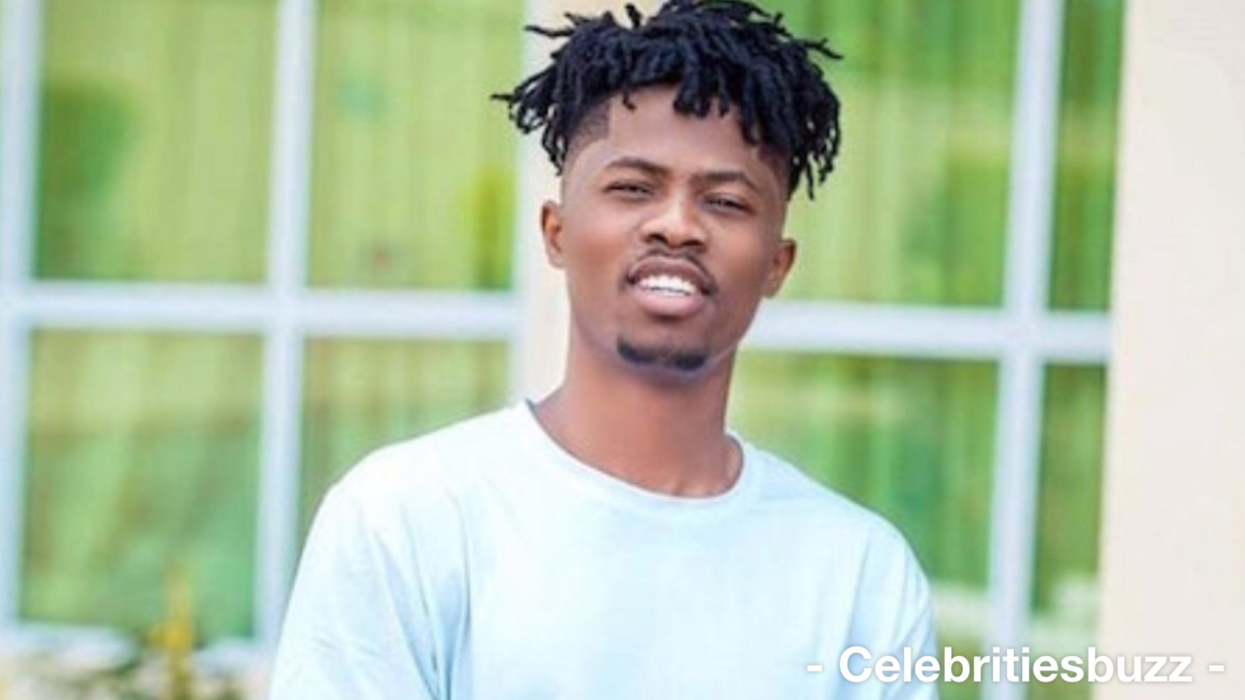 2560x1440 Kwesi Arthur Wallpaper