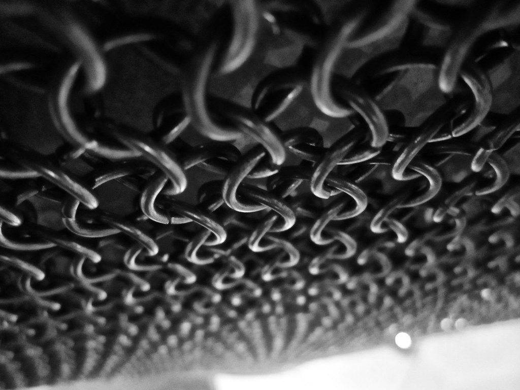 1024x768 Rings Of War. A picture of Chainmail, taken in a artistic m