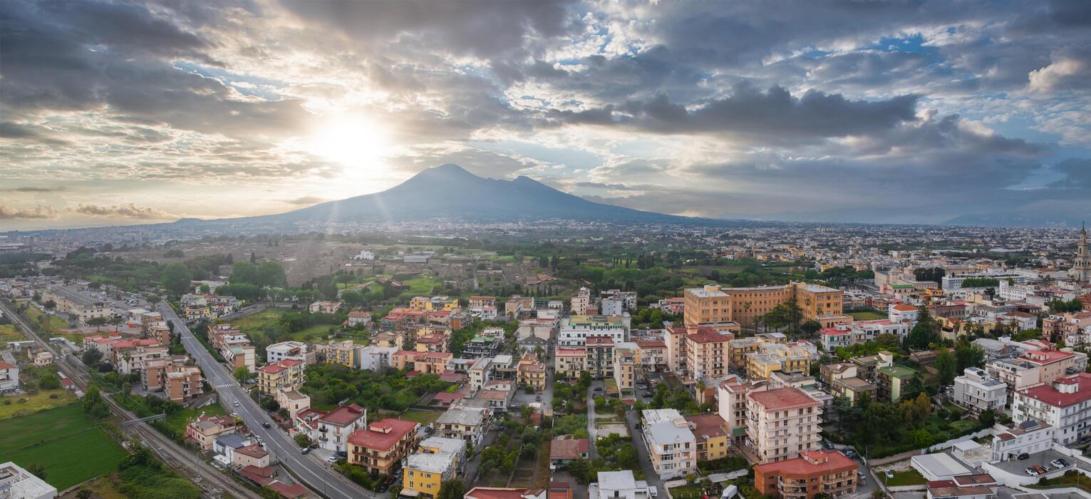 1531x700 Aerial View of Pompei, Italy, with Mount Vesuvius in the Background