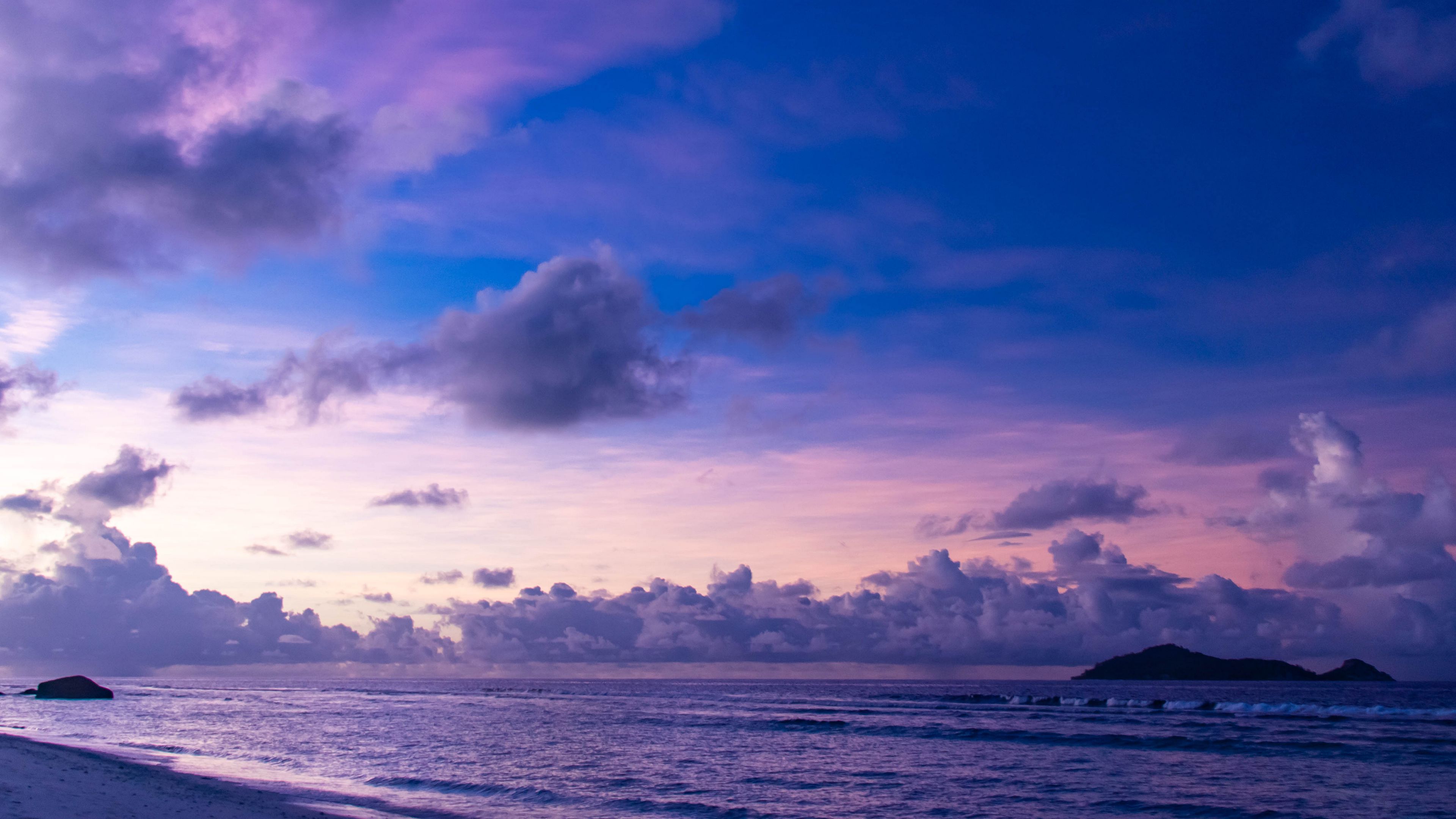 3840x2160 Sea Waves Twilight White Clouds Blue Sky Landscape View Of Mountains 4K HD Ocean Wallpaper