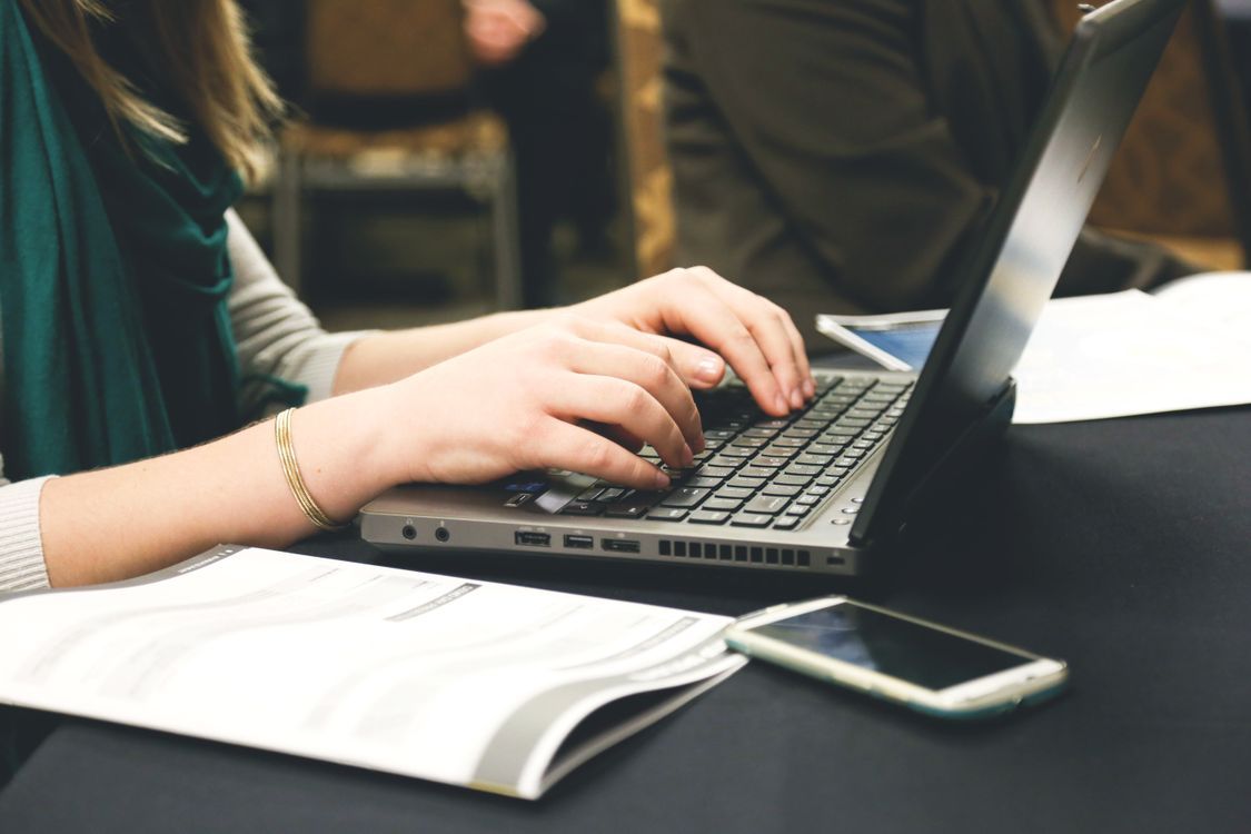 1125x750 Woman Typing on Laptop · Free