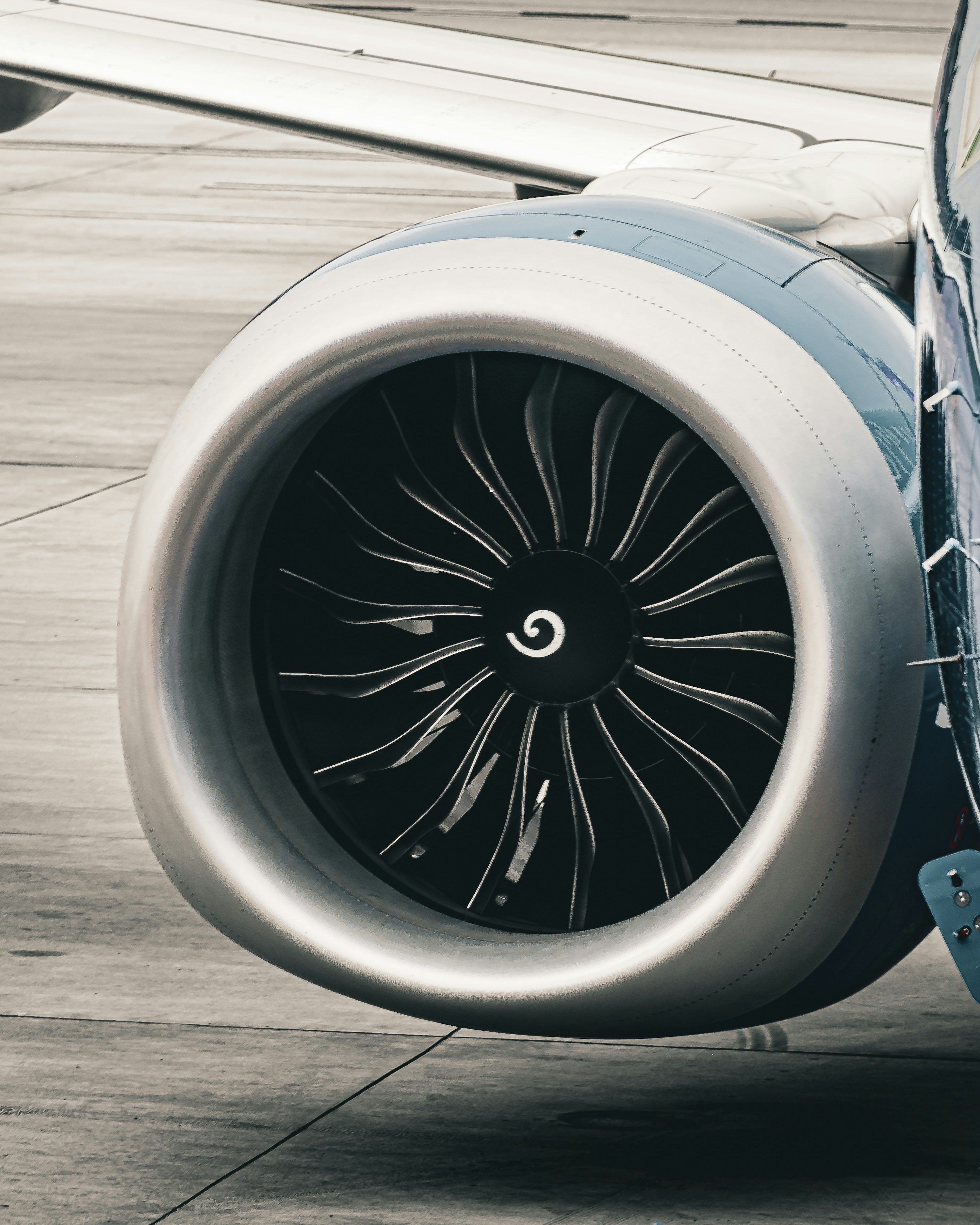 3000x3750 Close Up Of An Airplane Engine On A Runway. Photo
