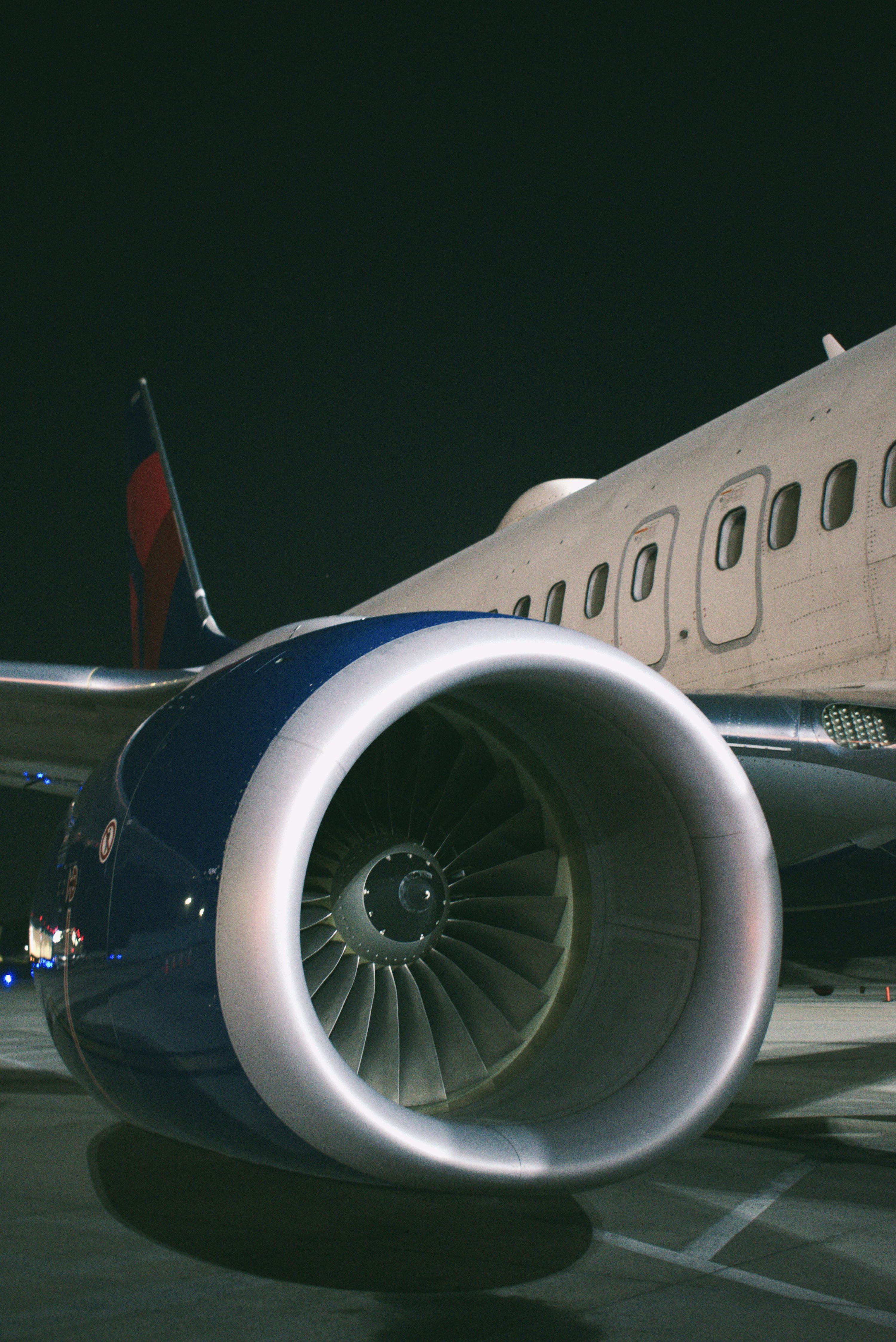 3000x4494 A close up of a jet engine on a plane photo