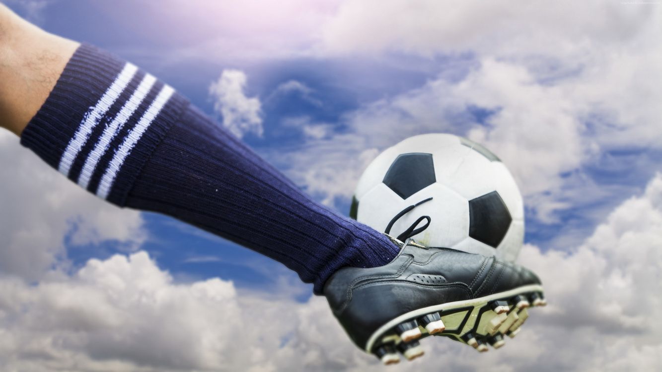 1333x750 Wallpaper Person Wearing Black and White Nike Soccer Cleats, Background Free Image