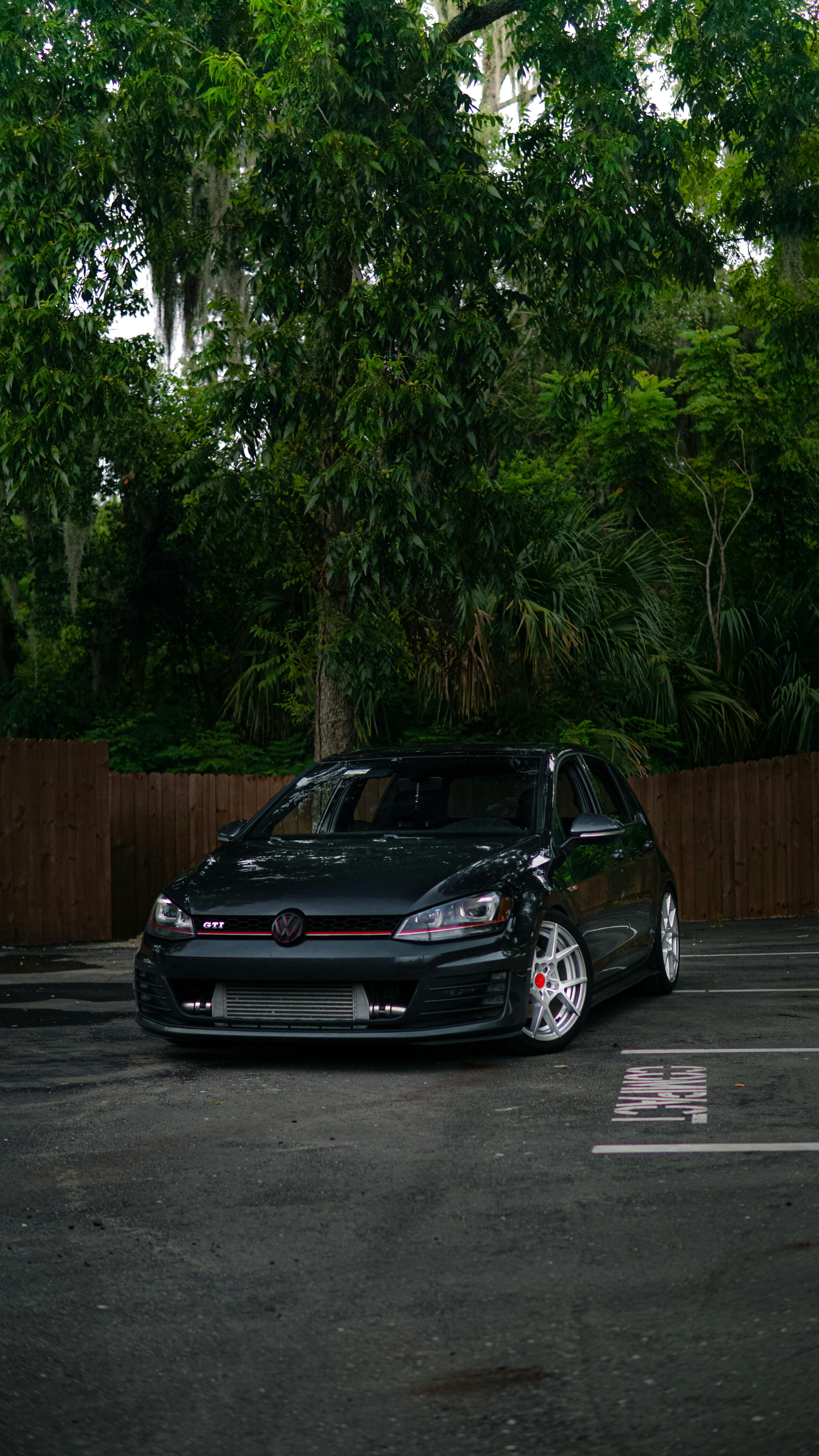 3376x6000 A Volkswagen Golf GTI on a Parking Lot · Free