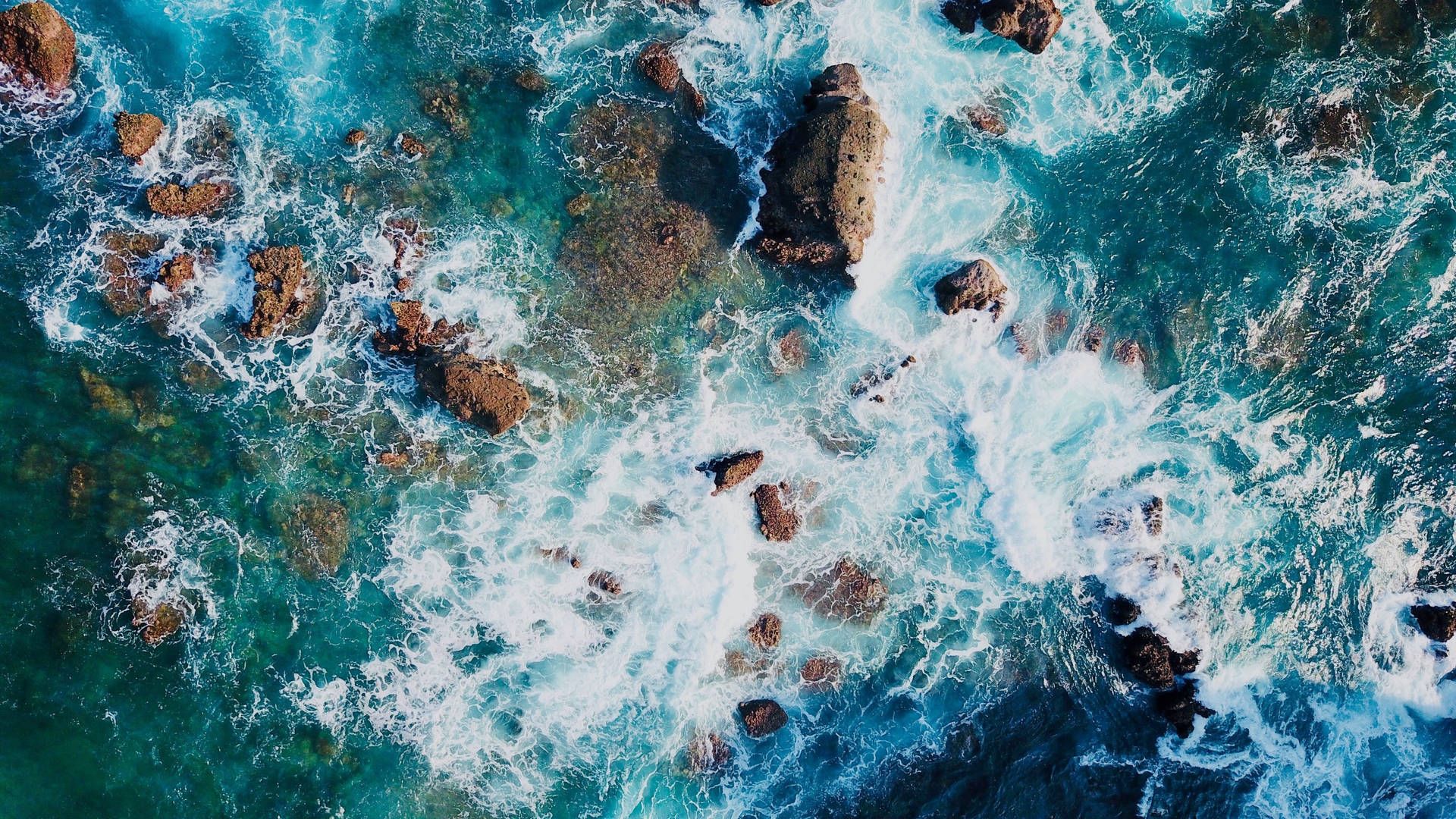 1920x1080 Download Rocky Clear Blue Sea iMac 4K Wallpaper