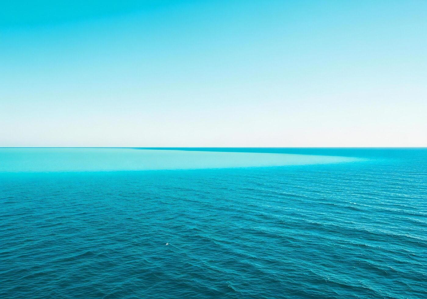 1400x980 Nature background, Nature wallpaper, Vast ocean horizon with two distinct shades of blue water under a clear pale blue sky