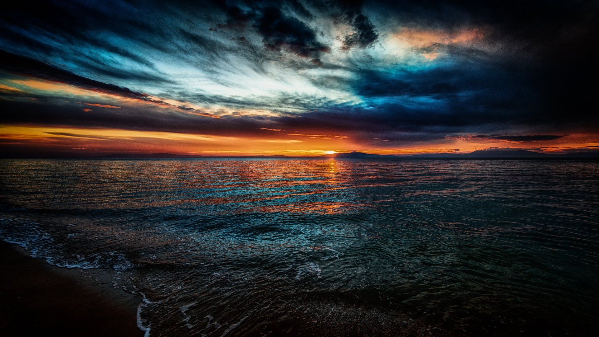 1920x1080 Dark Horizon Sunset Over Ocean Waves