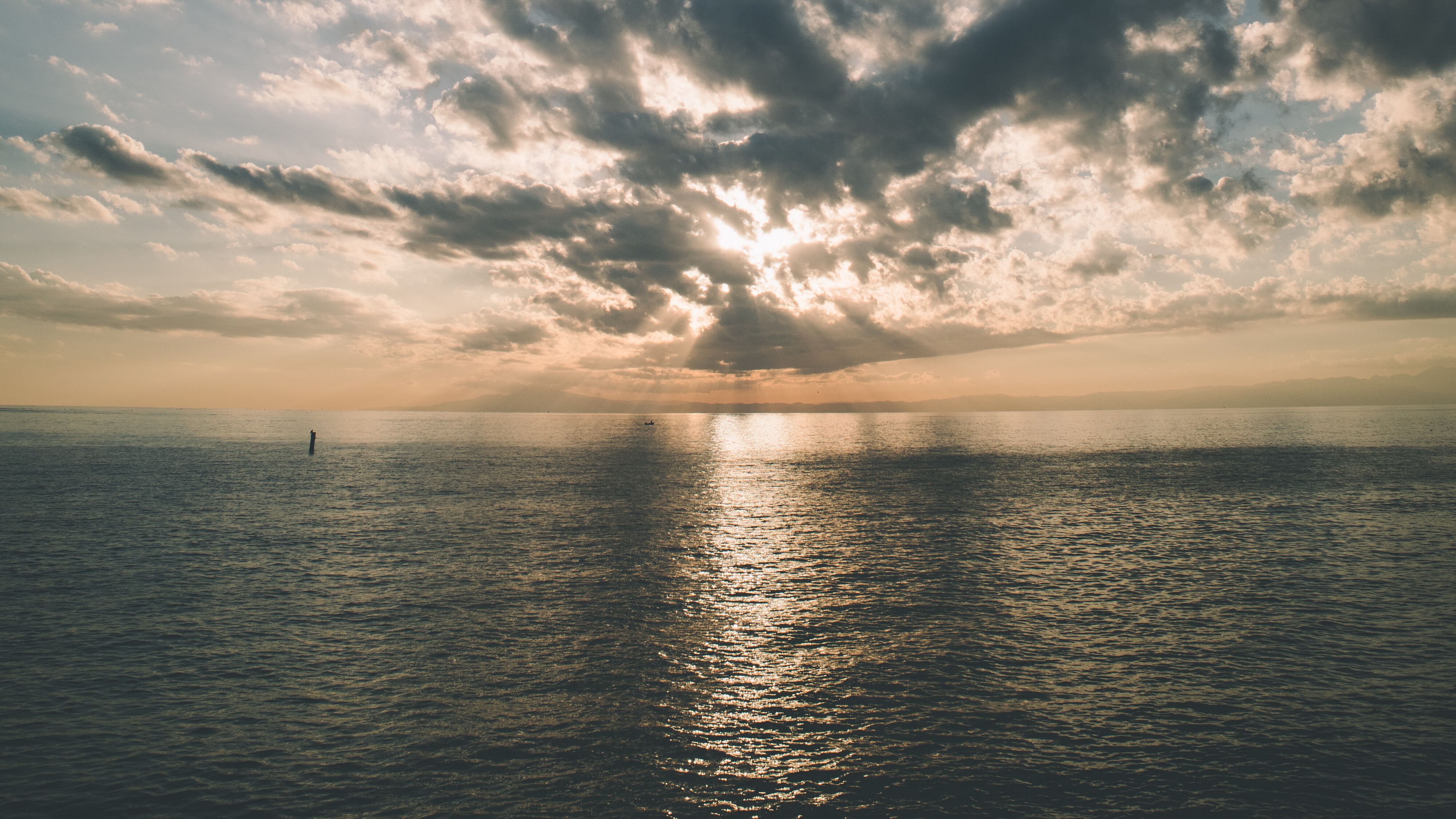 3840x2160 Sea Ocean Horizon Black Clouds Landscape Blue Sky 4K HD Nature Wallpaper