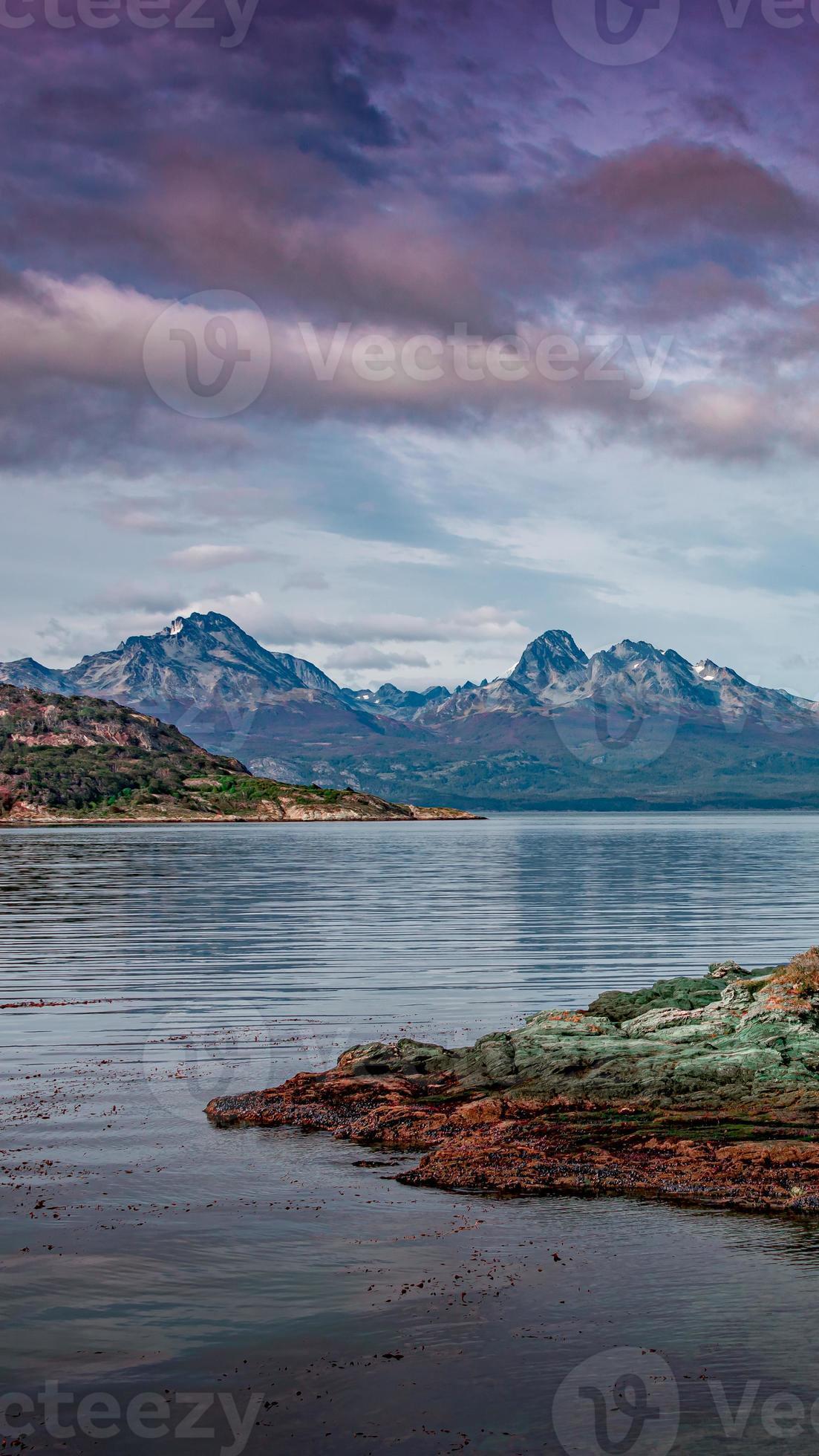 1103x1960 Beautiful sunset at Ensenada Zaratiegui Bay in Tierra del Fuego National Park, near Ushuaia and Beagle Channel, with geological mineral deposits, Patagonia, Argentina, early Autumn