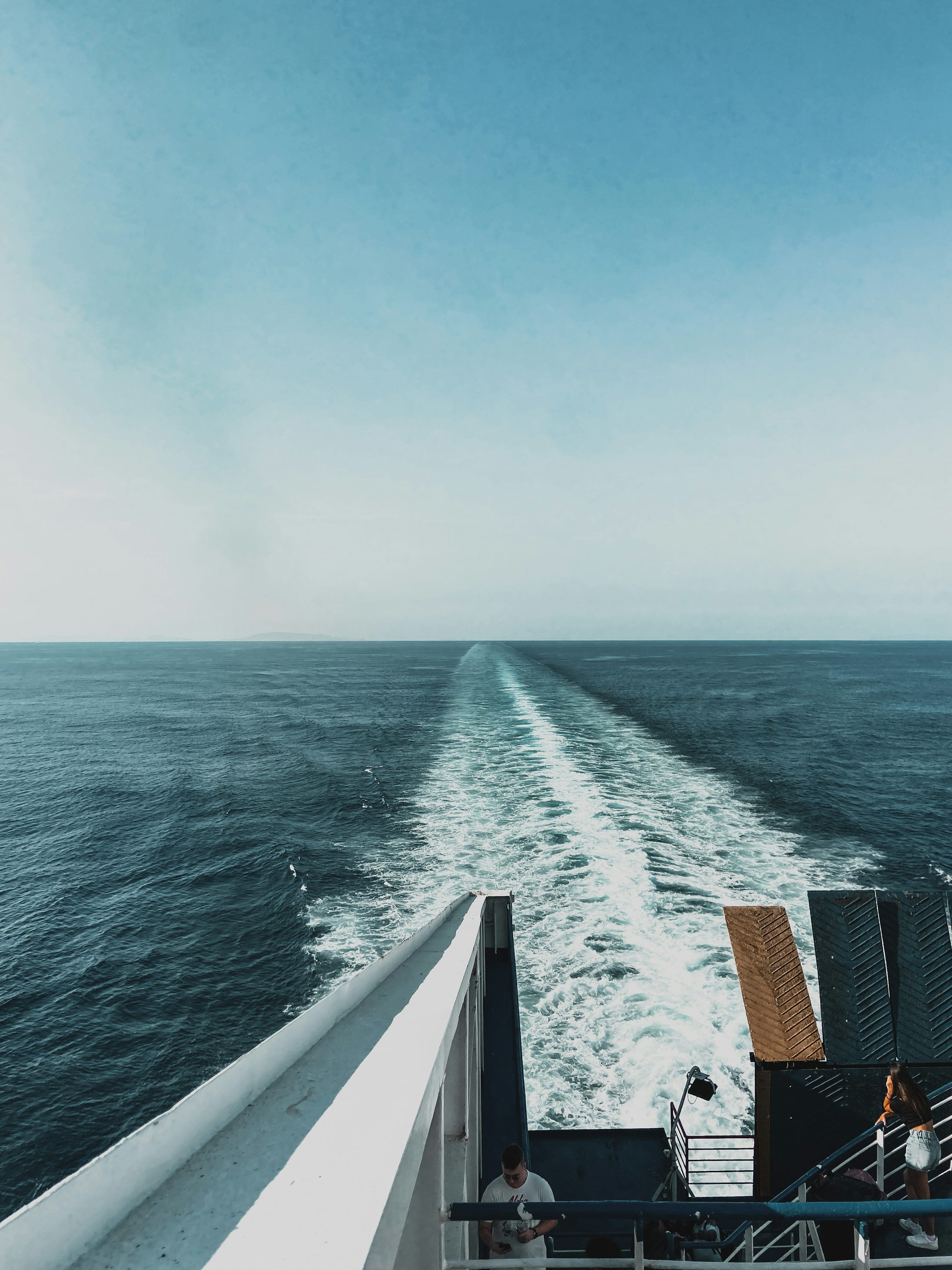 3000x4000 White and yellow ship on sea during daytime photo