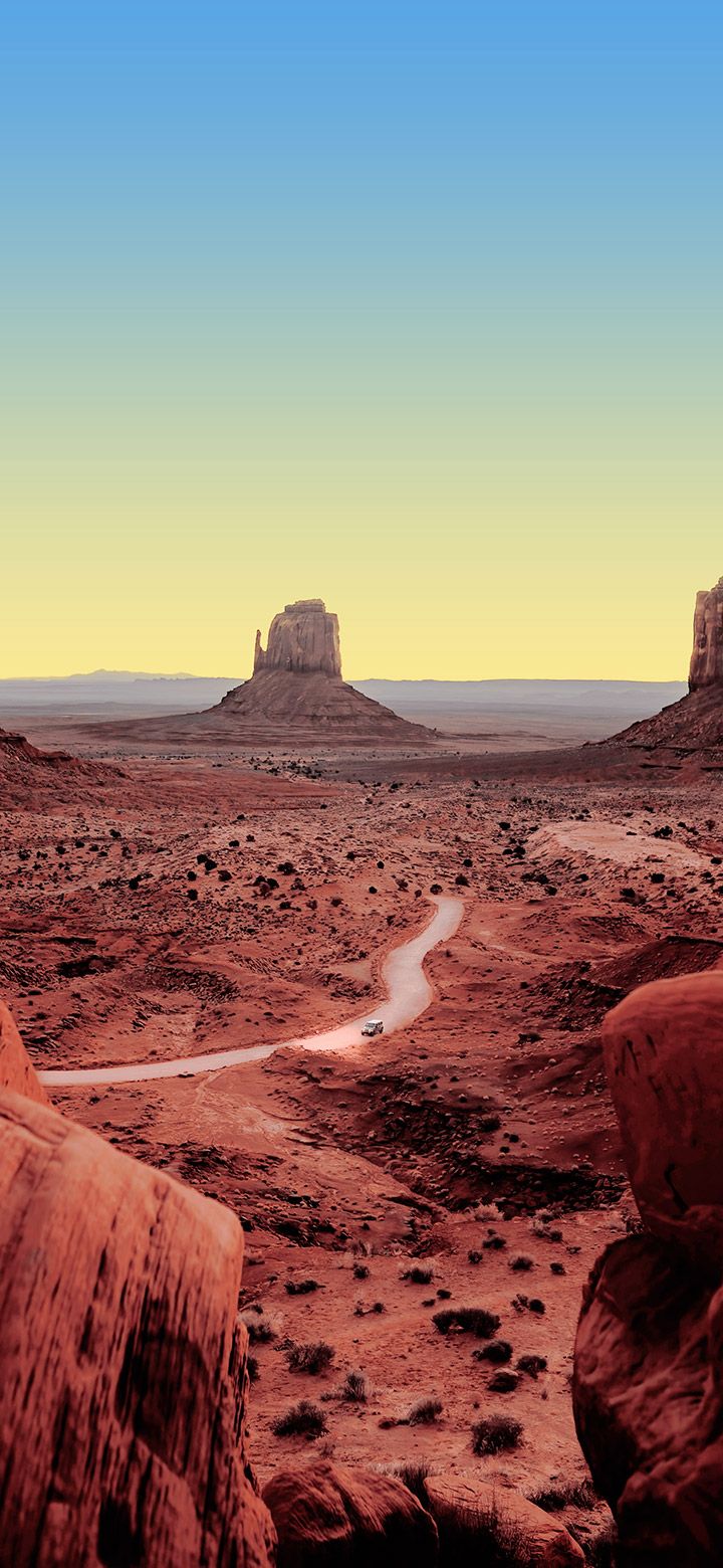 720x1560 Desert scene with a narrow road passing across 4K iphone Wallpaper
